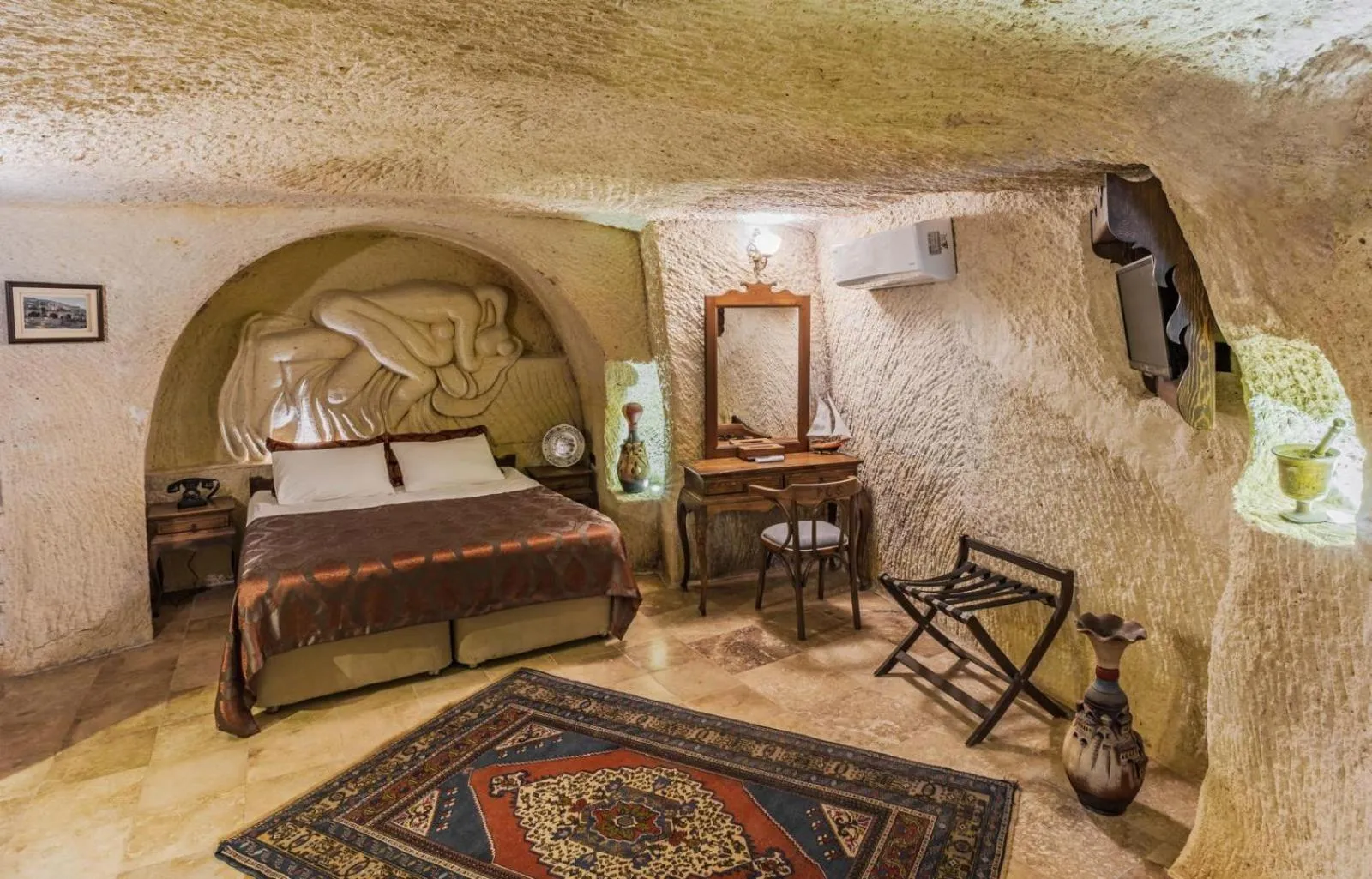Bed in Phocas Cave Suites