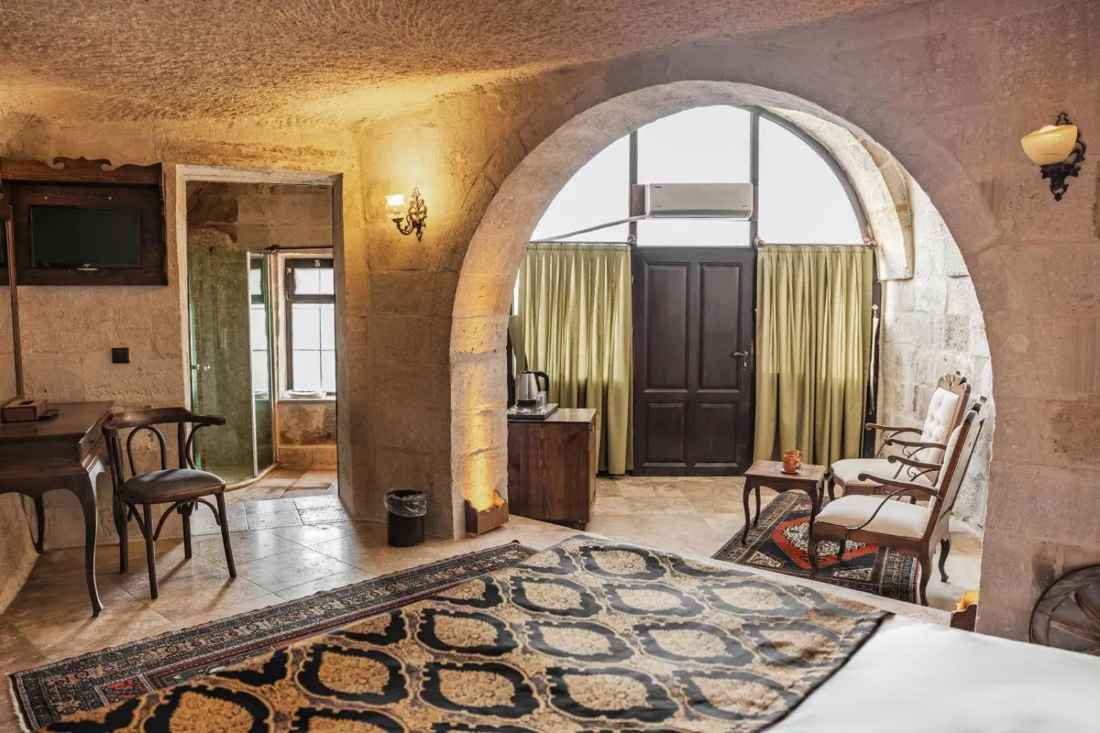 Living room, Bed in Phocas Cave Suites