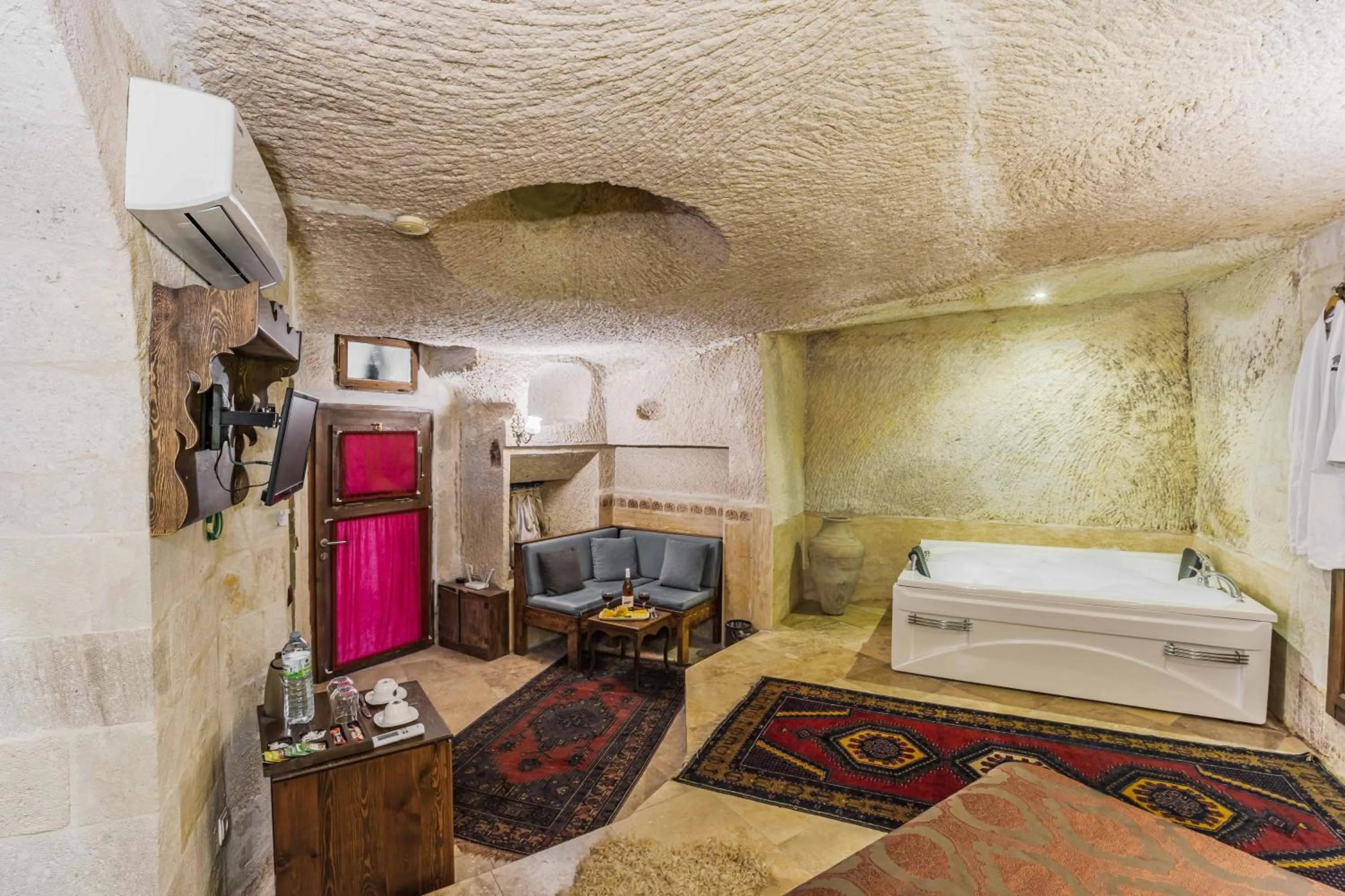 Bed in Phocas Cave Suites