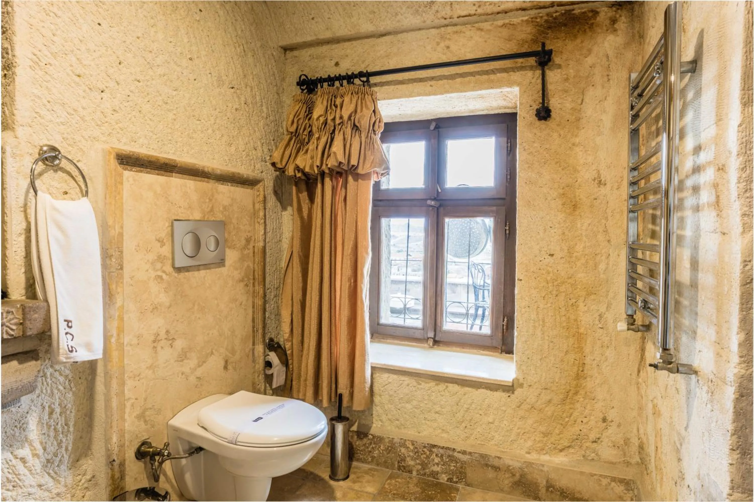 Toilet in Phocas Cave Suites