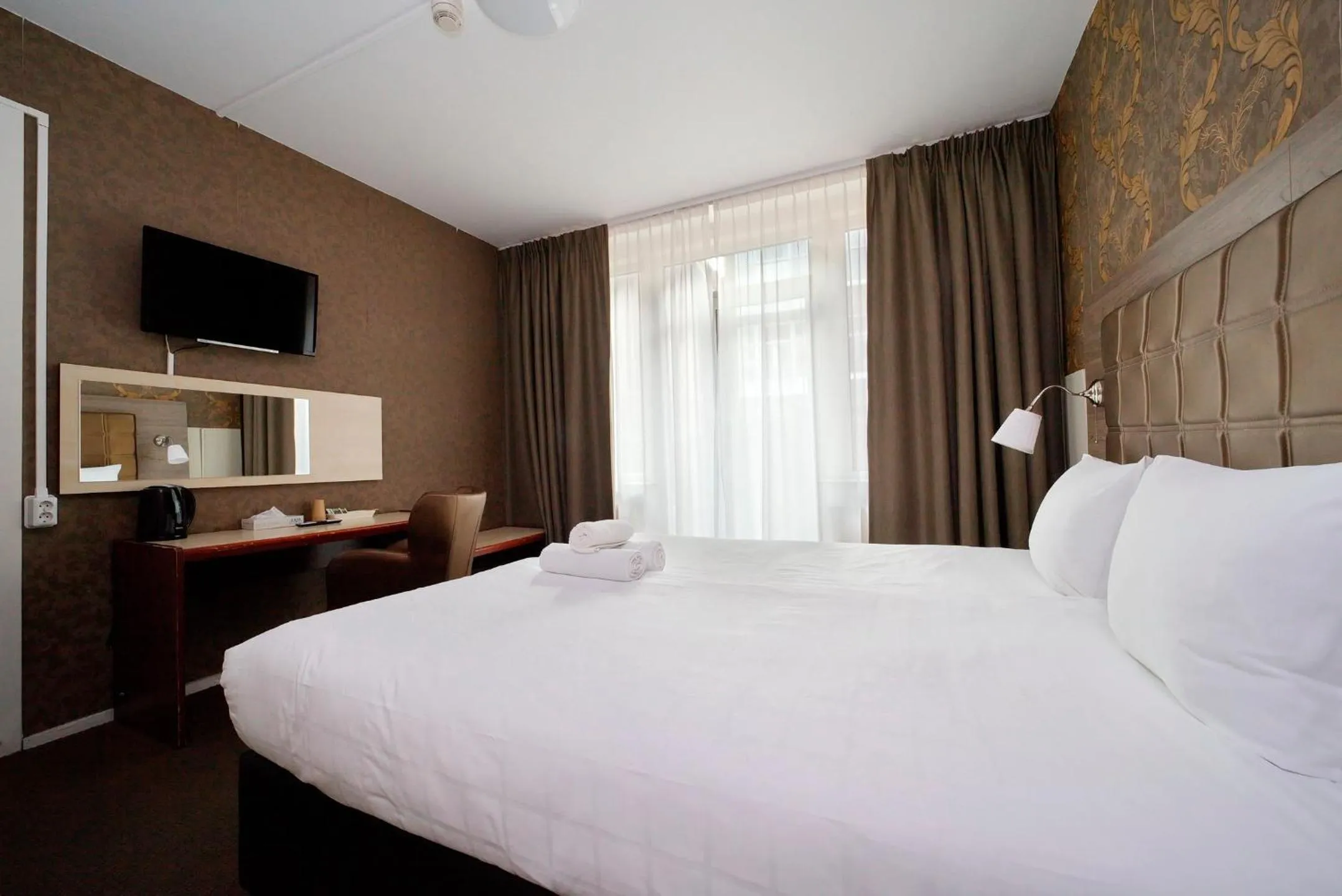 TV and multimedia, Bed in Aadam Wilhelmina Hotel