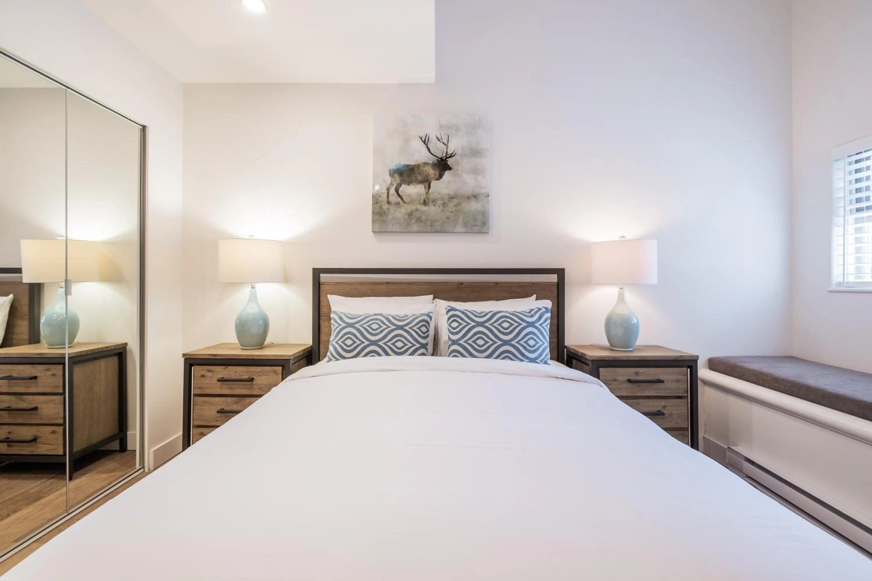 Bed in Lake Placid Lodge by Outpost Whistler