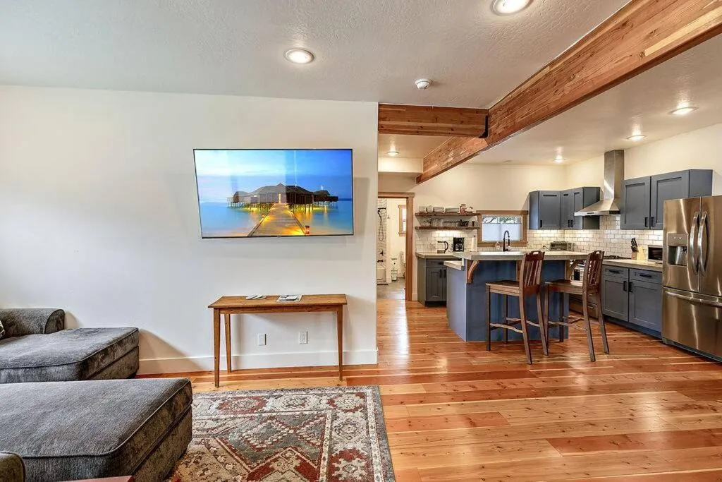 Communal lounge/ TV room in The Mountain House by WanderLodges
