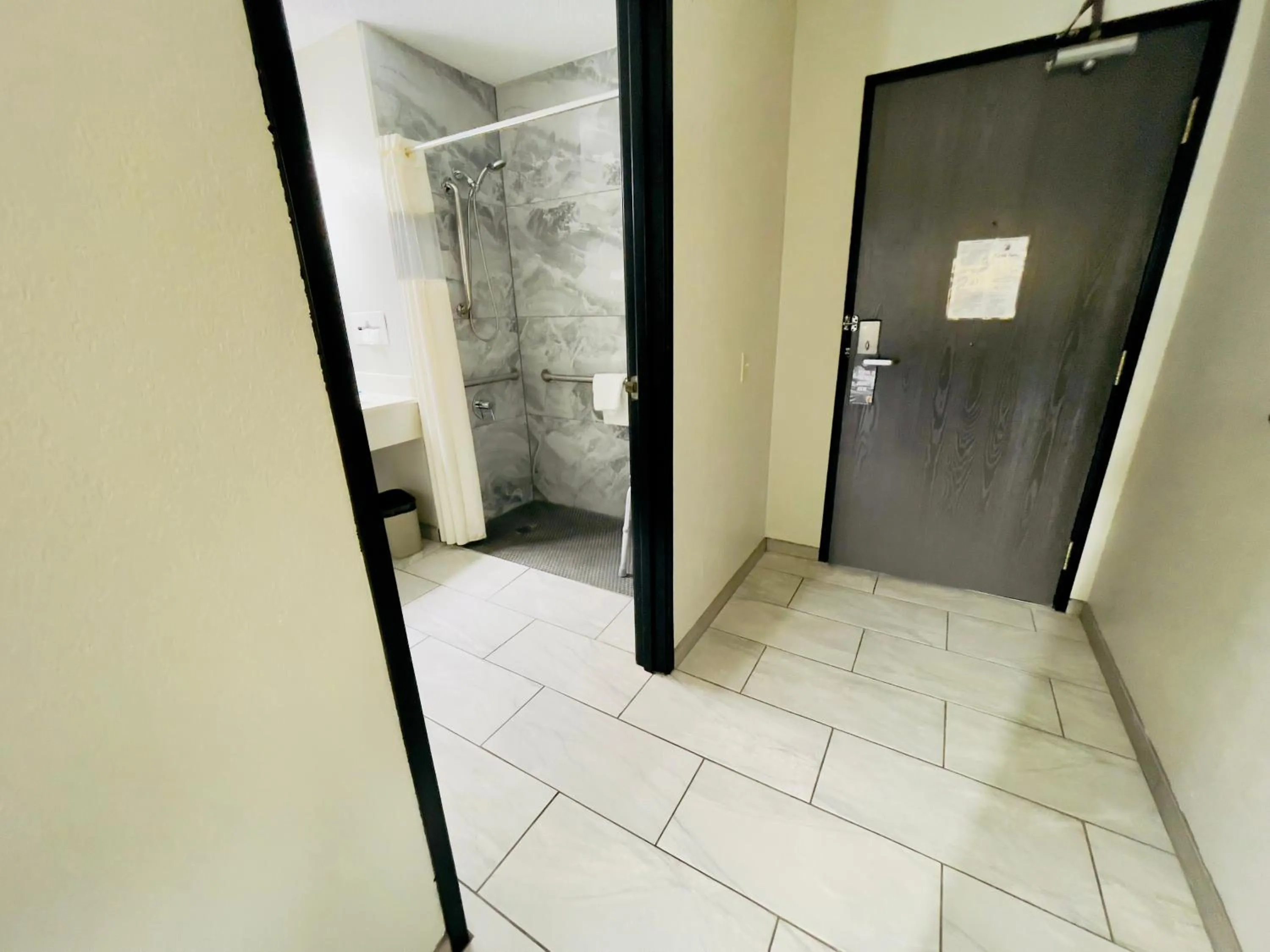 Shower in Super 8 by Wyndham Shakopee