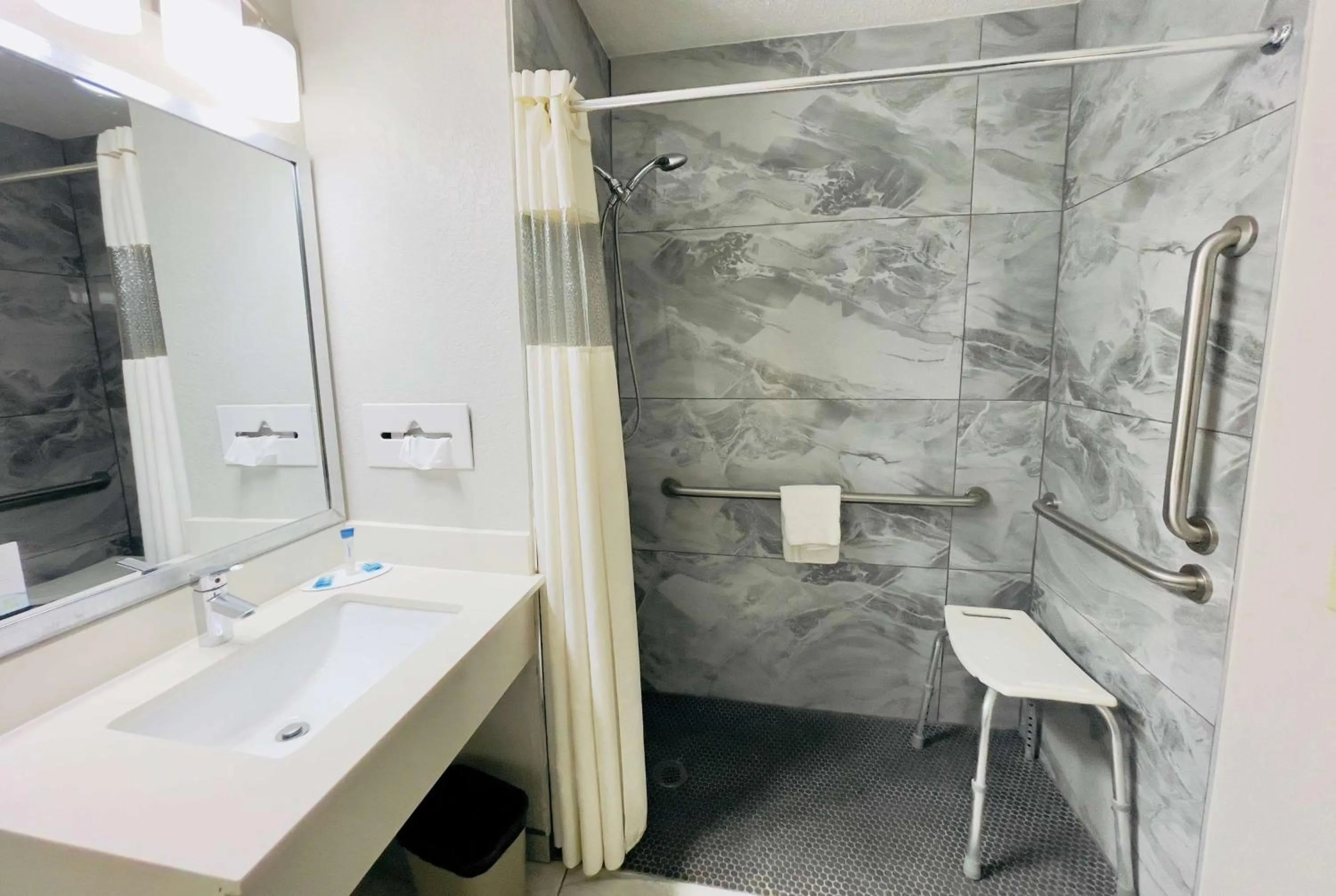 Shower in Super 8 by Wyndham Shakopee