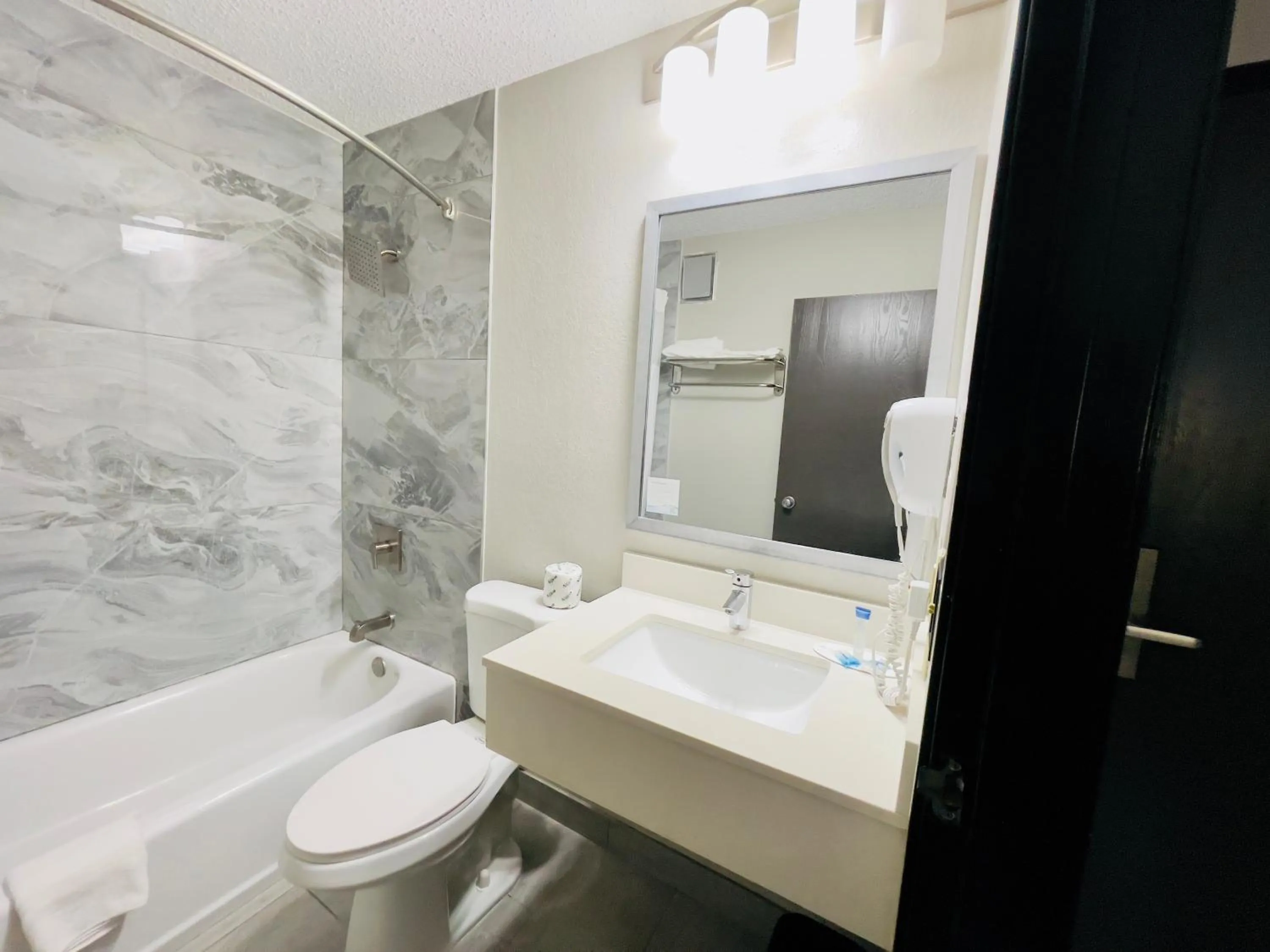 Bathroom in Super 8 by Wyndham Shakopee