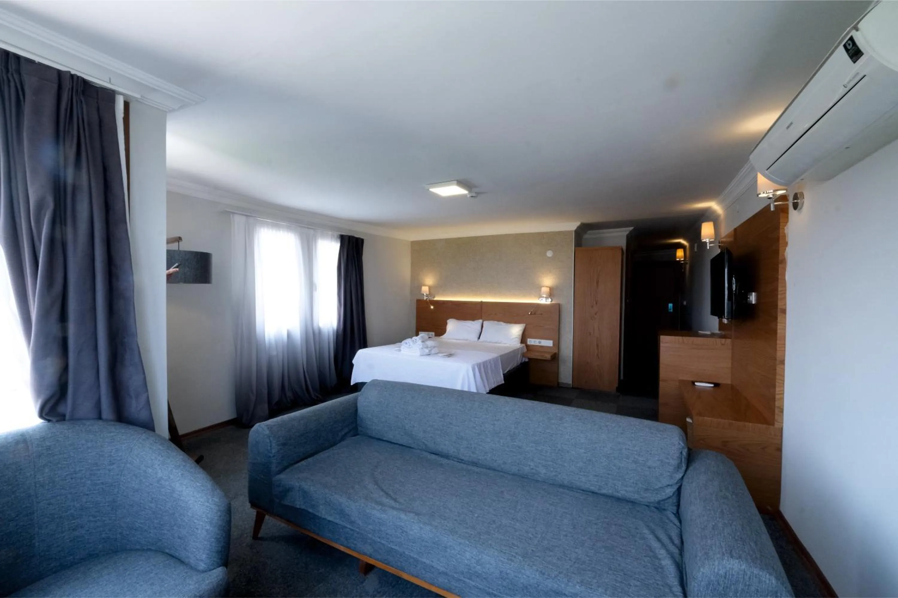 Seating area, Bed in Varyant Hotel