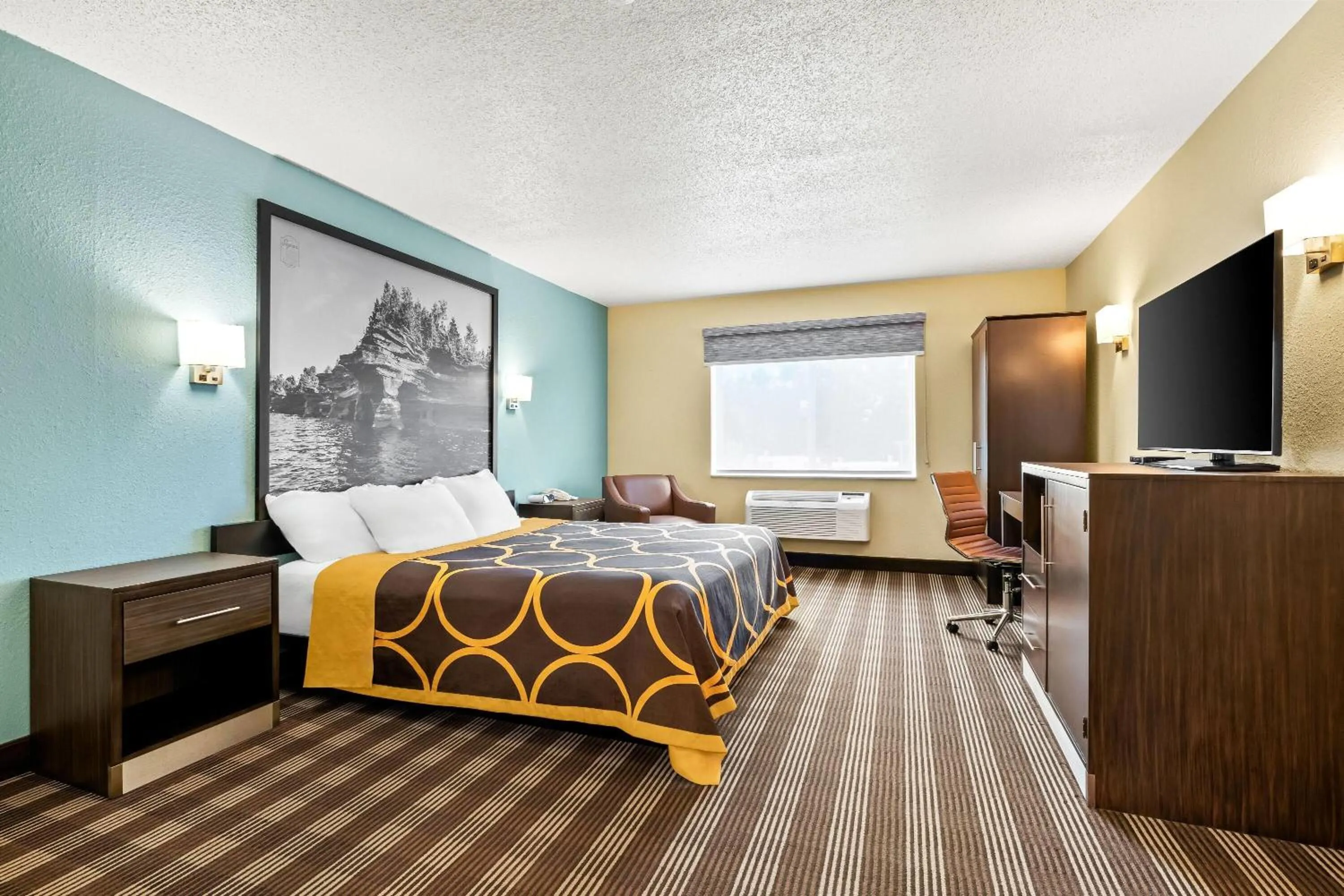 Bed in Super 8 by Wyndham Osseo WI