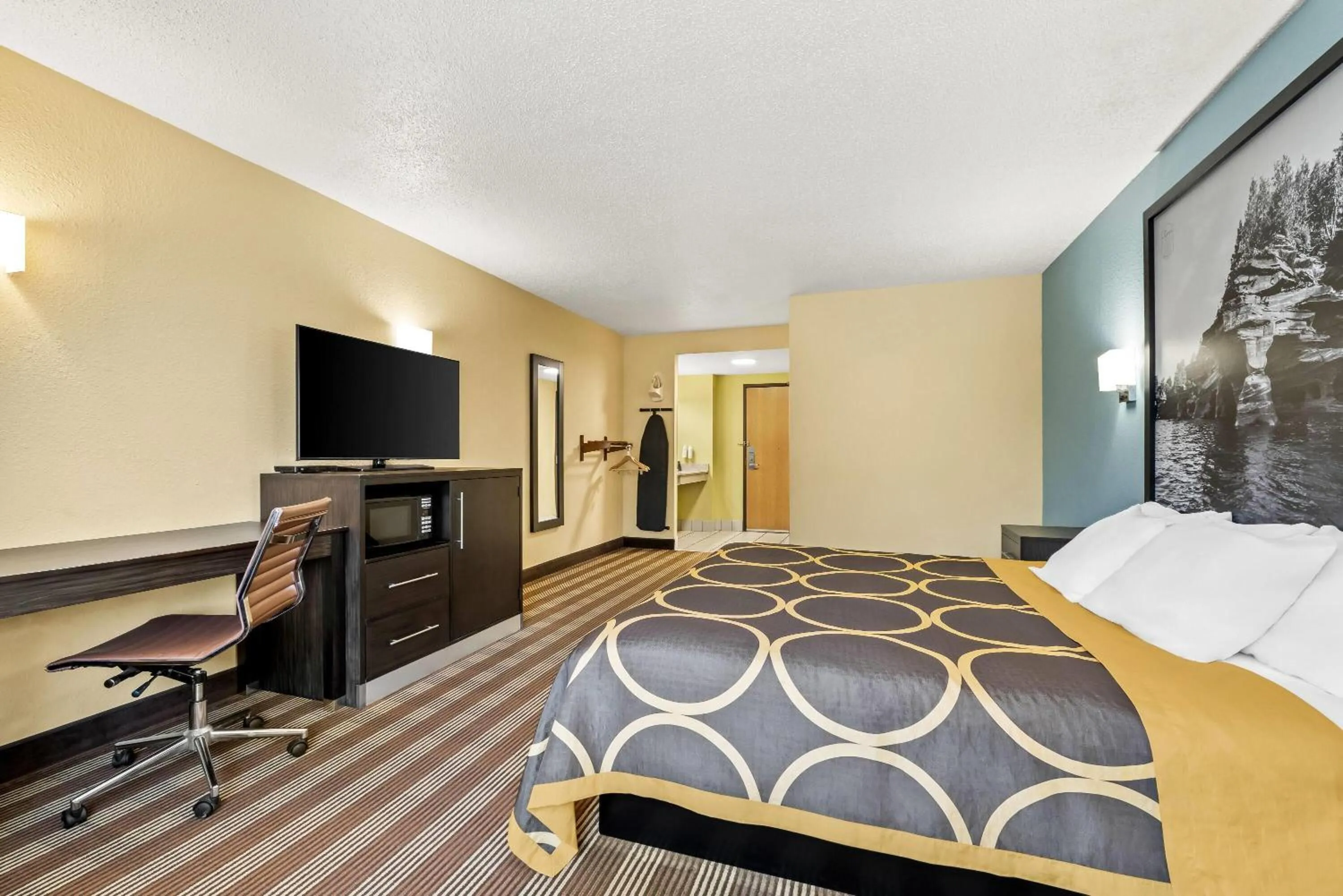 Bed in Super 8 by Wyndham Osseo WI