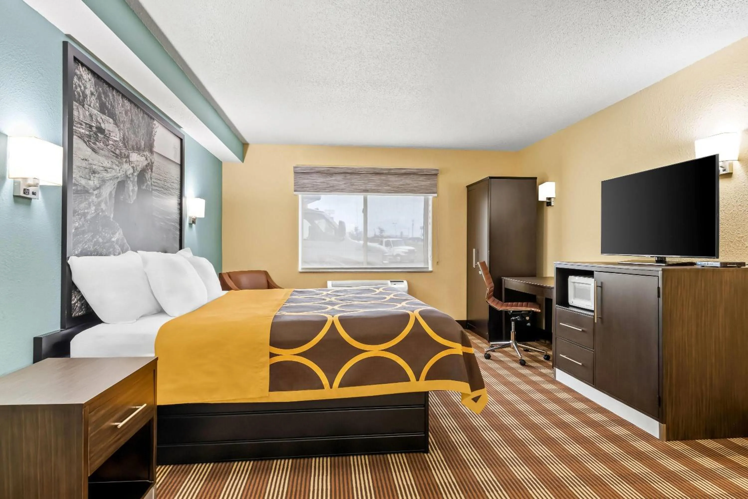 Bed in Super 8 by Wyndham Osseo WI