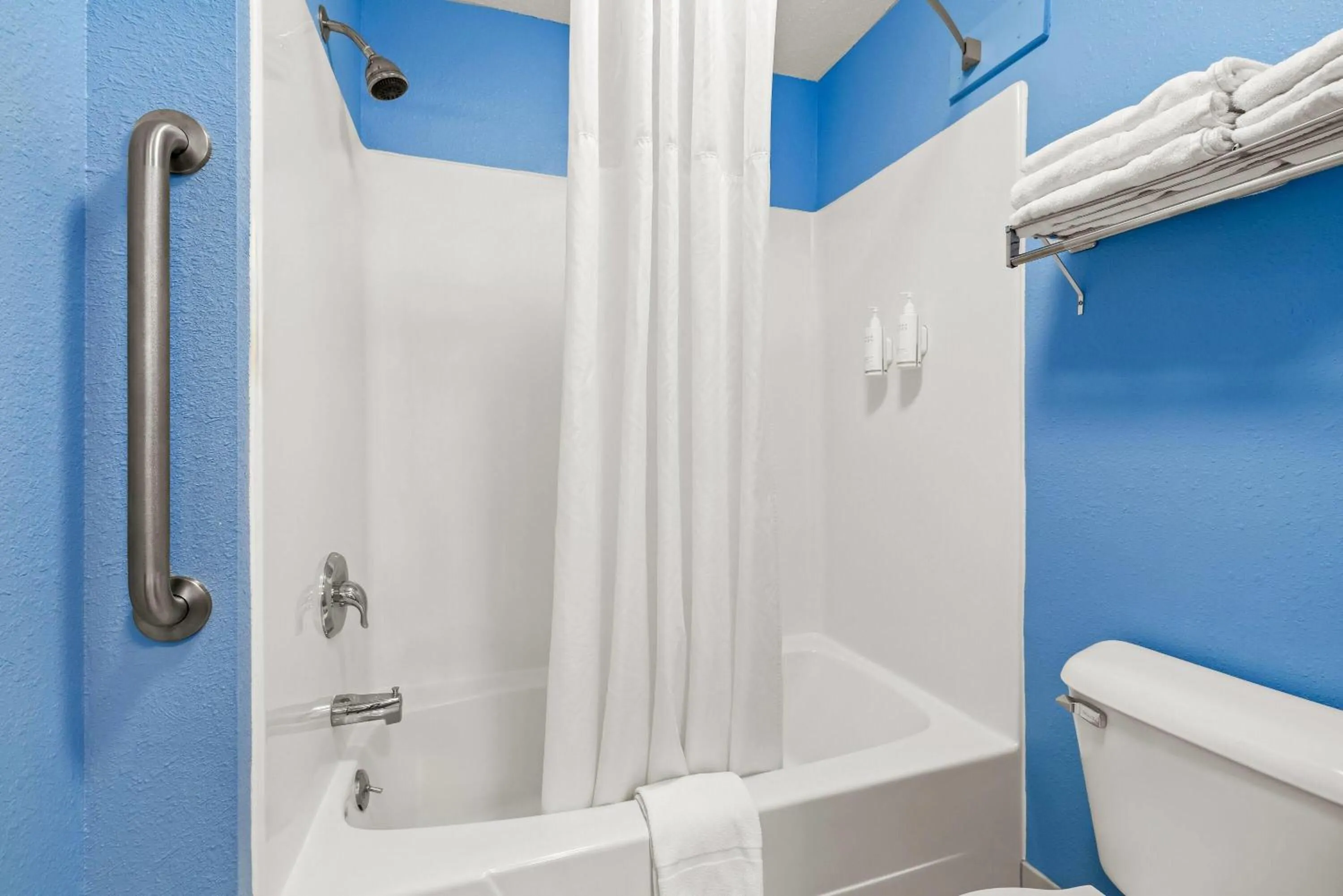 Bathroom in Super 8 by Wyndham Osseo WI