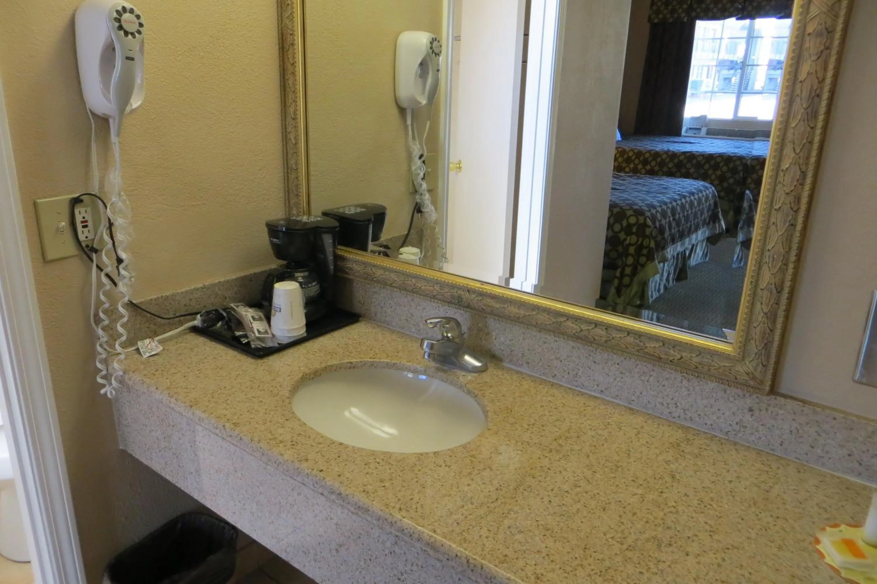 Bathroom in American Inn Stockton