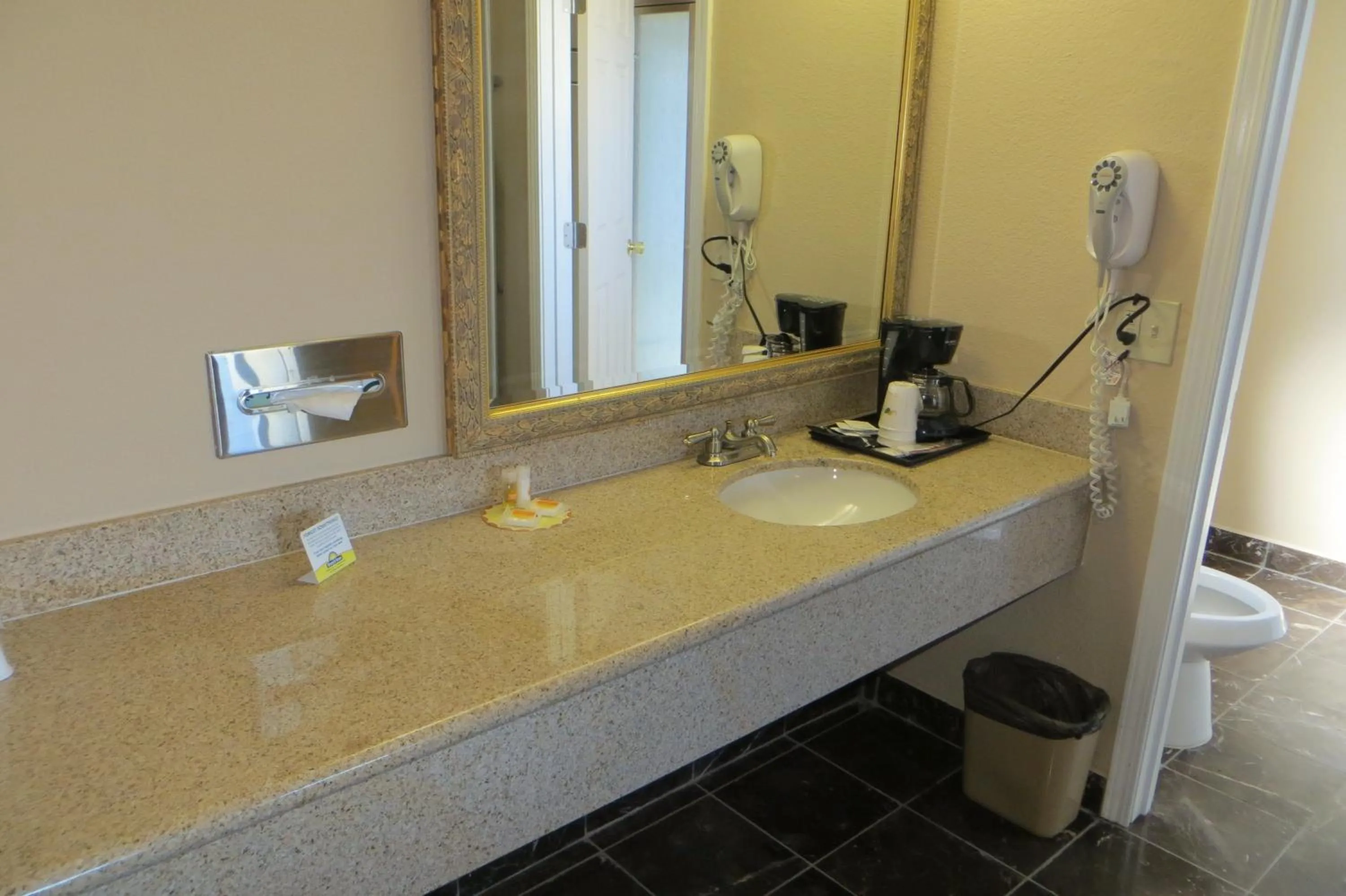 Bathroom in American Inn Stockton