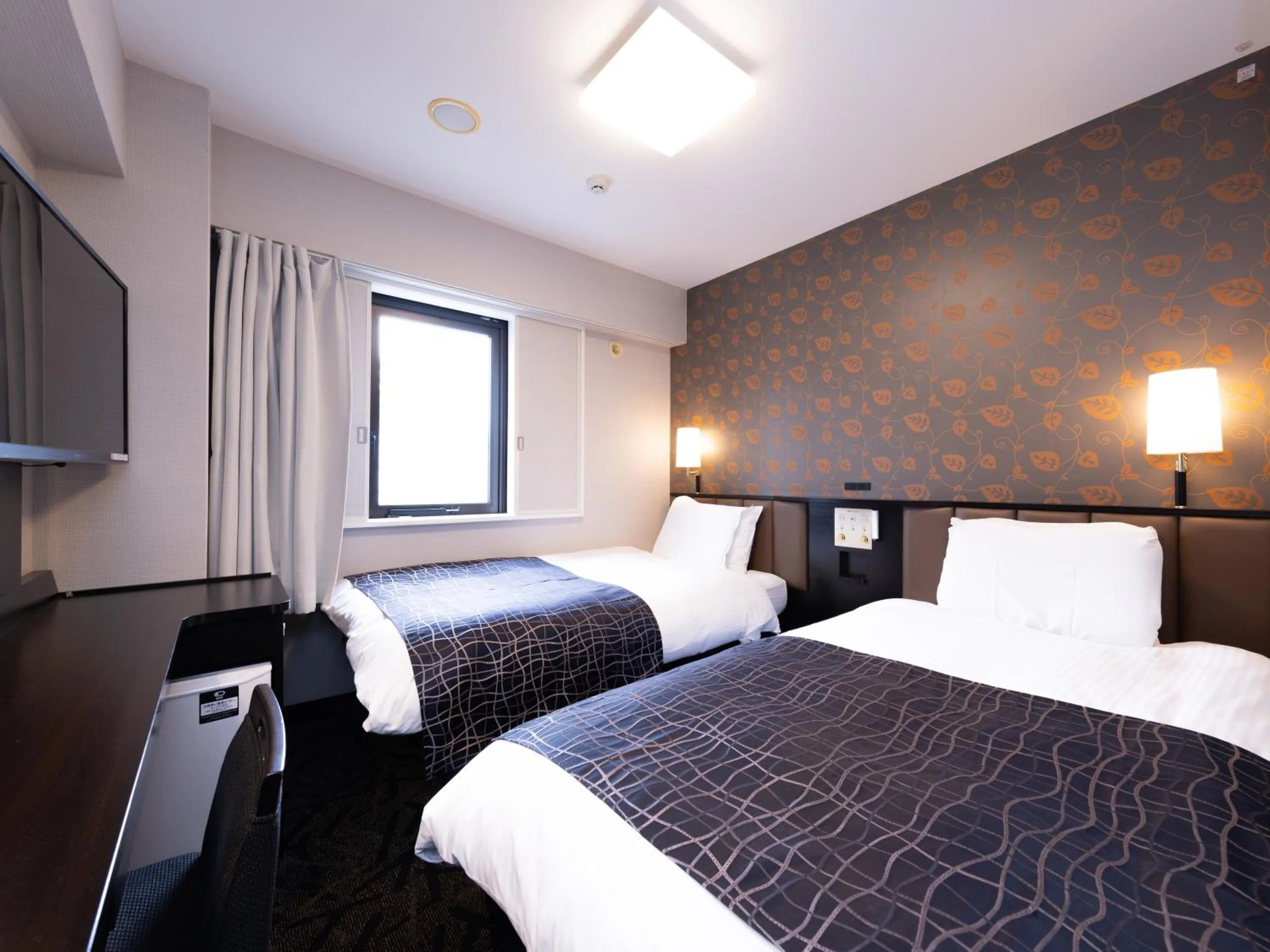 Bed in APA Hotel Aomori Ekihigashi