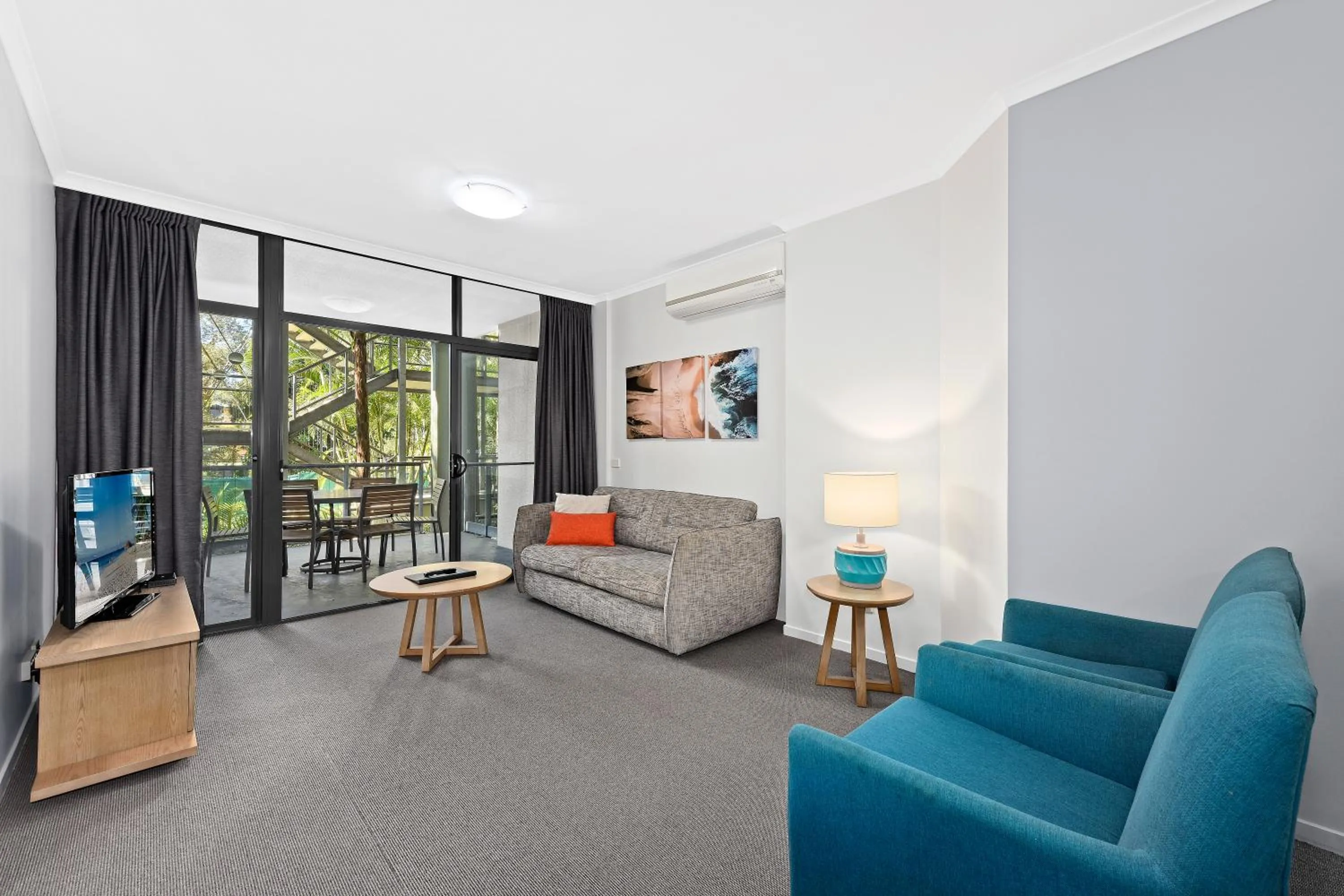 Living room in Club Wyndham Flynns Beach, Trademark Collection by Wyndham