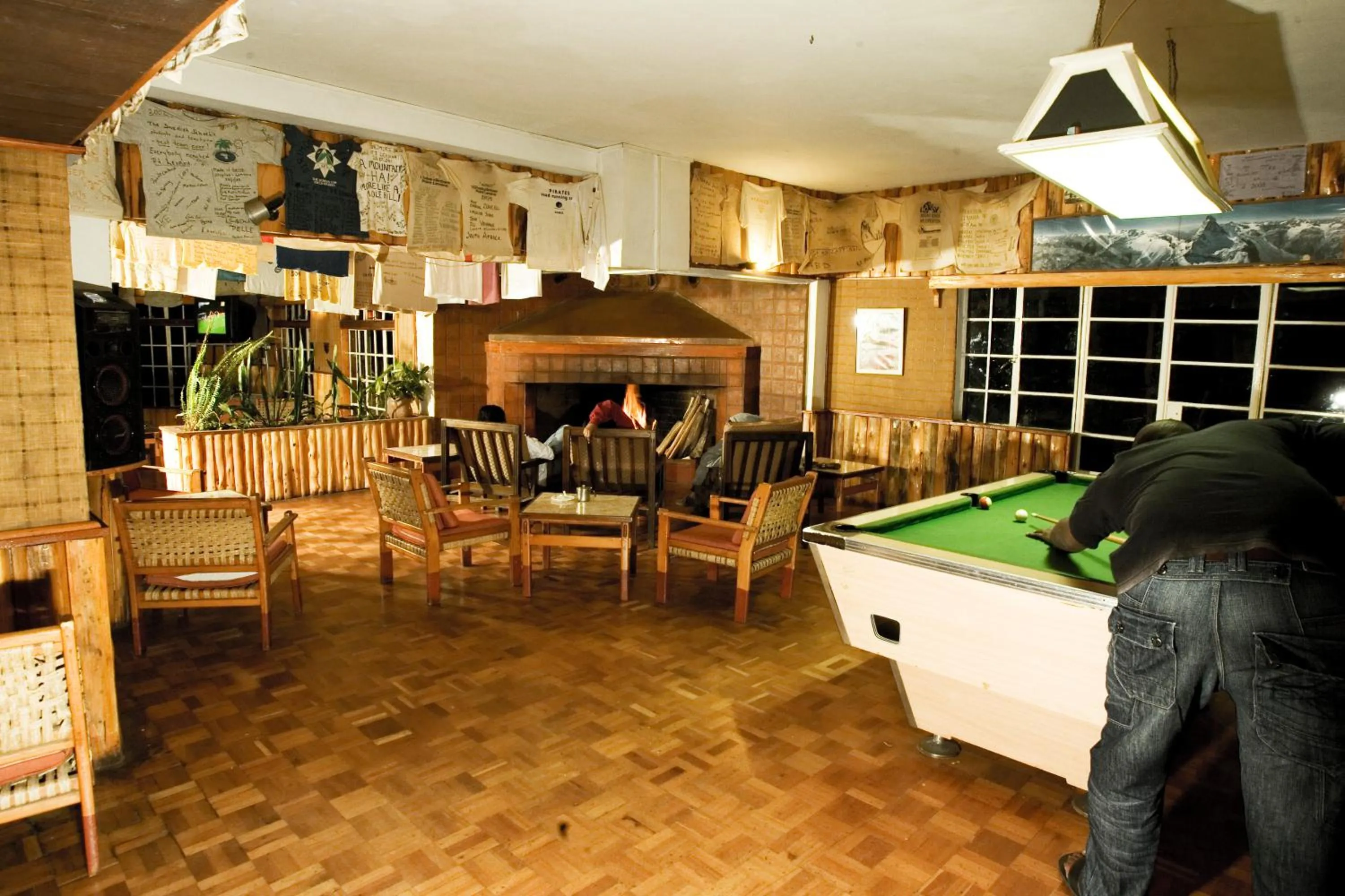 Communal lounge/ TV room in Naro Moru River Lodge