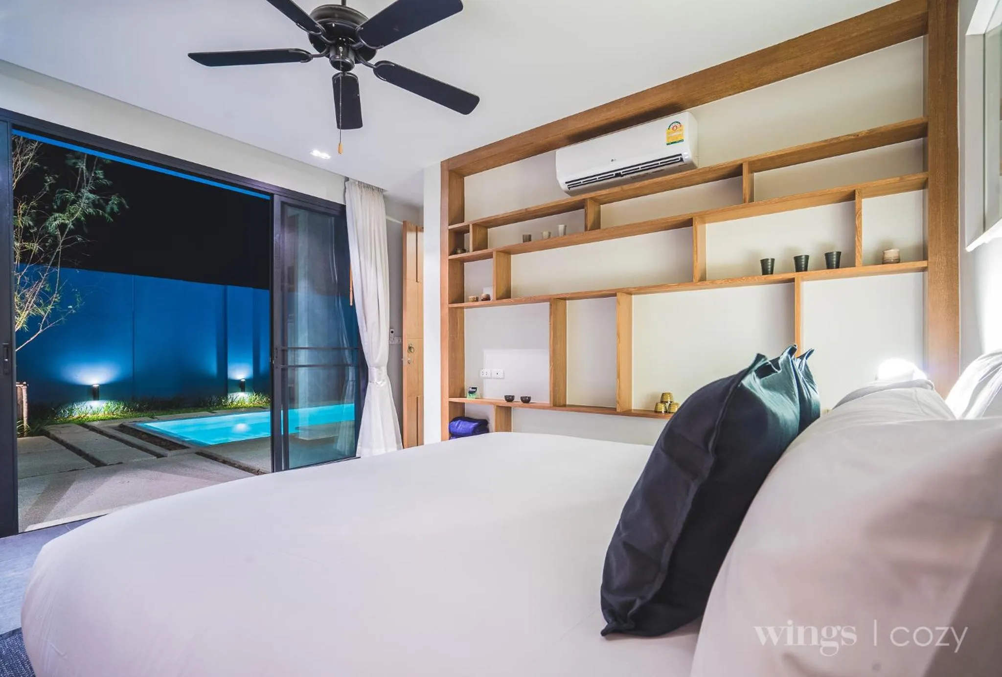 Text overlay, Bed in Wings Phuket Villa by Two Villas HOLIDAY