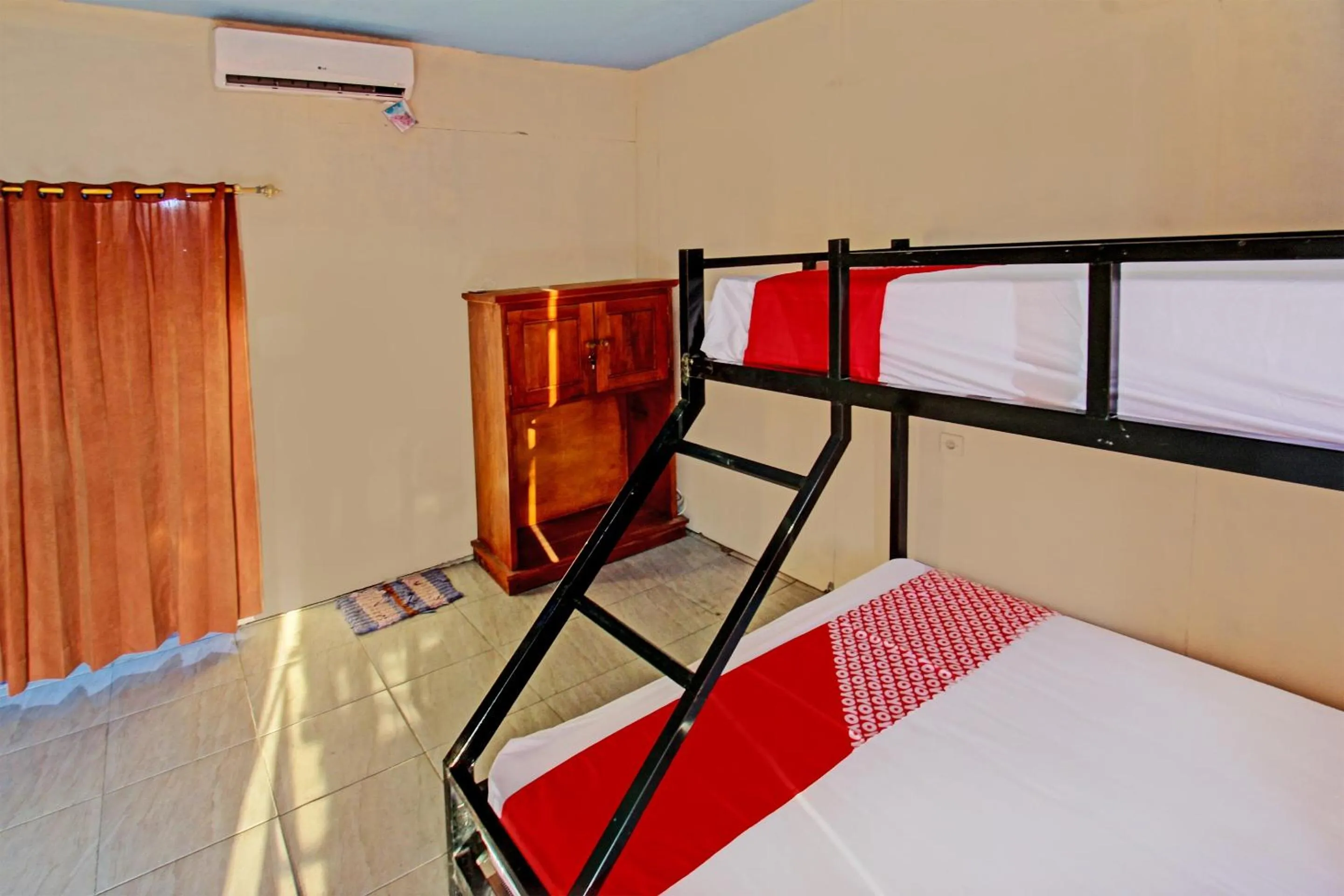 Bedroom in OYO 93121 Abi Bungalow & Hostel