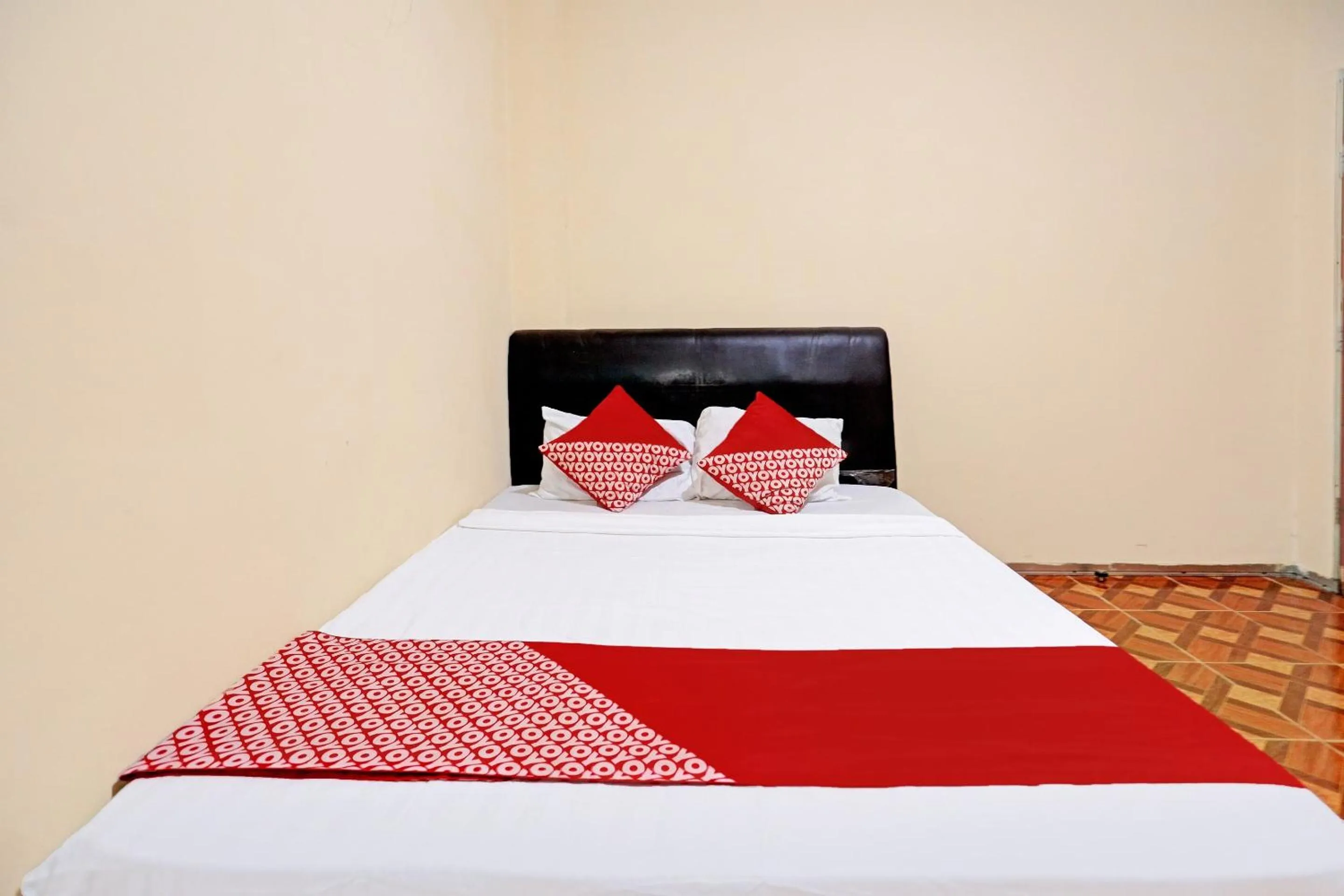 Bedroom in OYO 92553 Caitlin Homestay