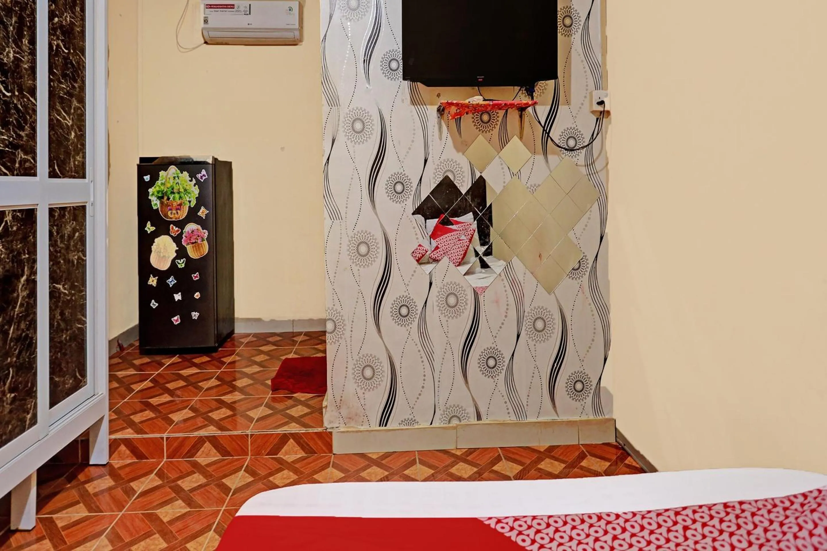 Bedroom in OYO 92553 Caitlin Homestay