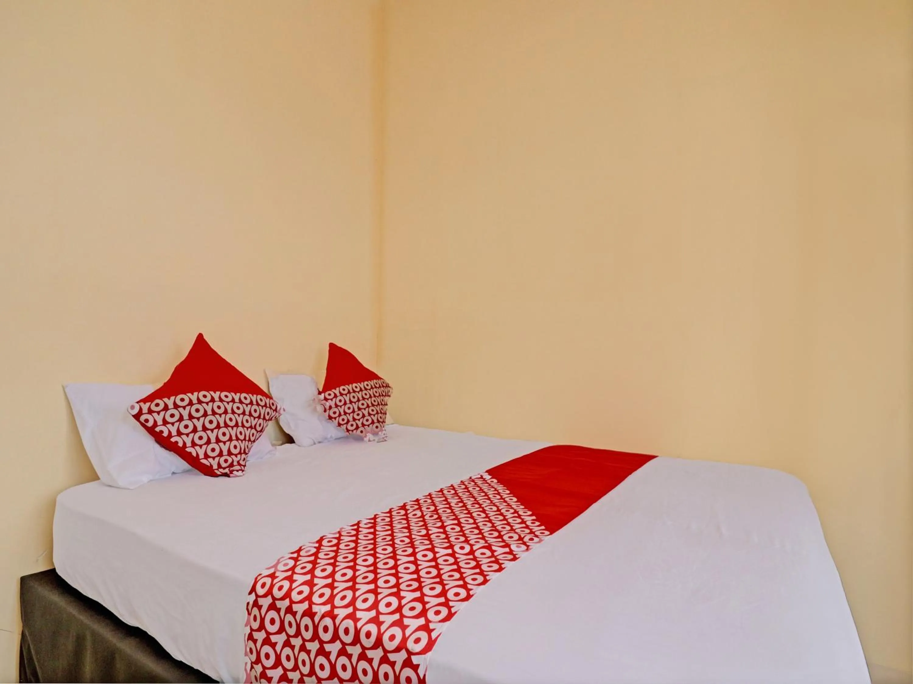 Bedroom in Hotel O Excellent Kost