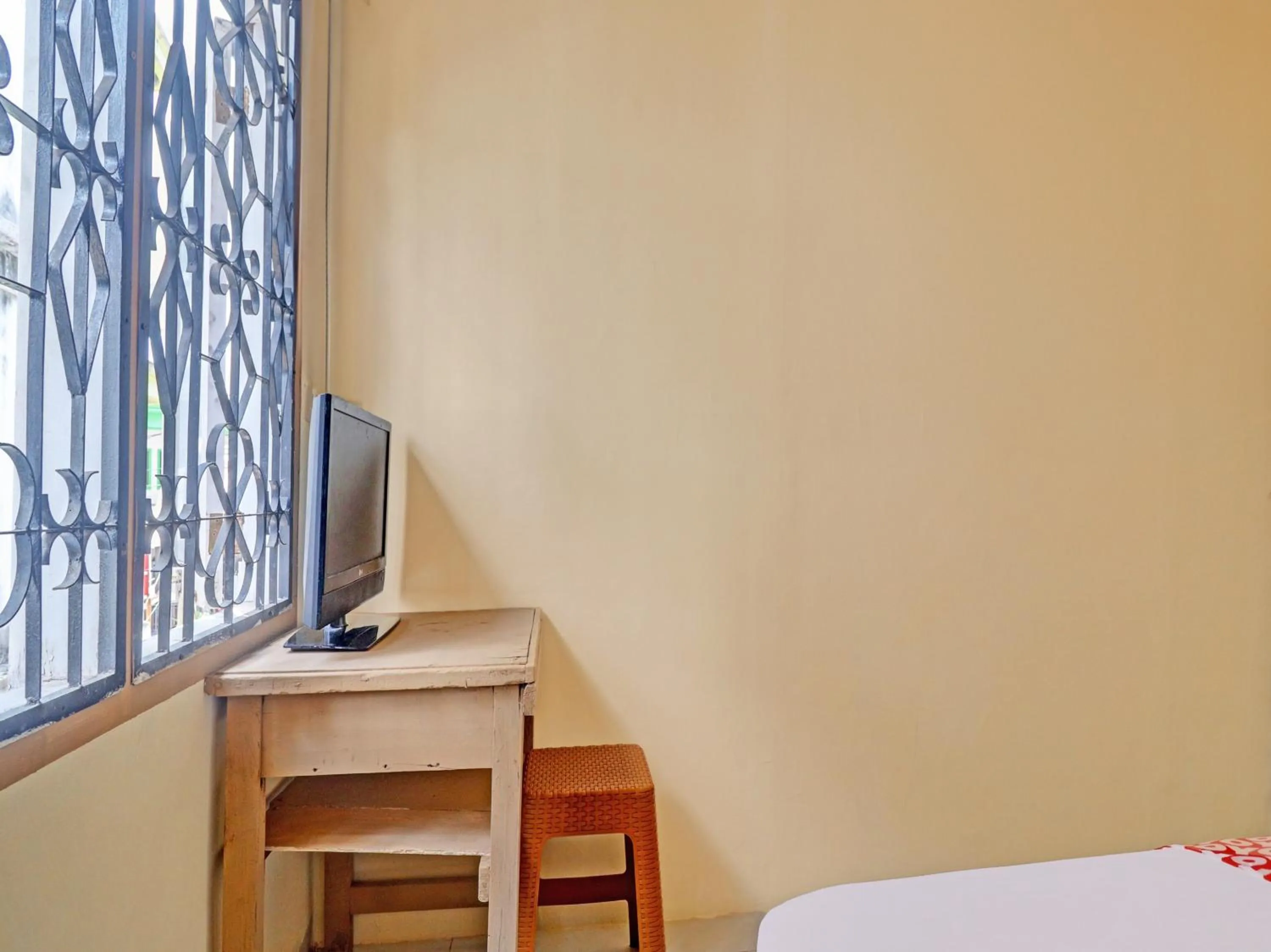 Bedroom in Hotel O Excellent Kost