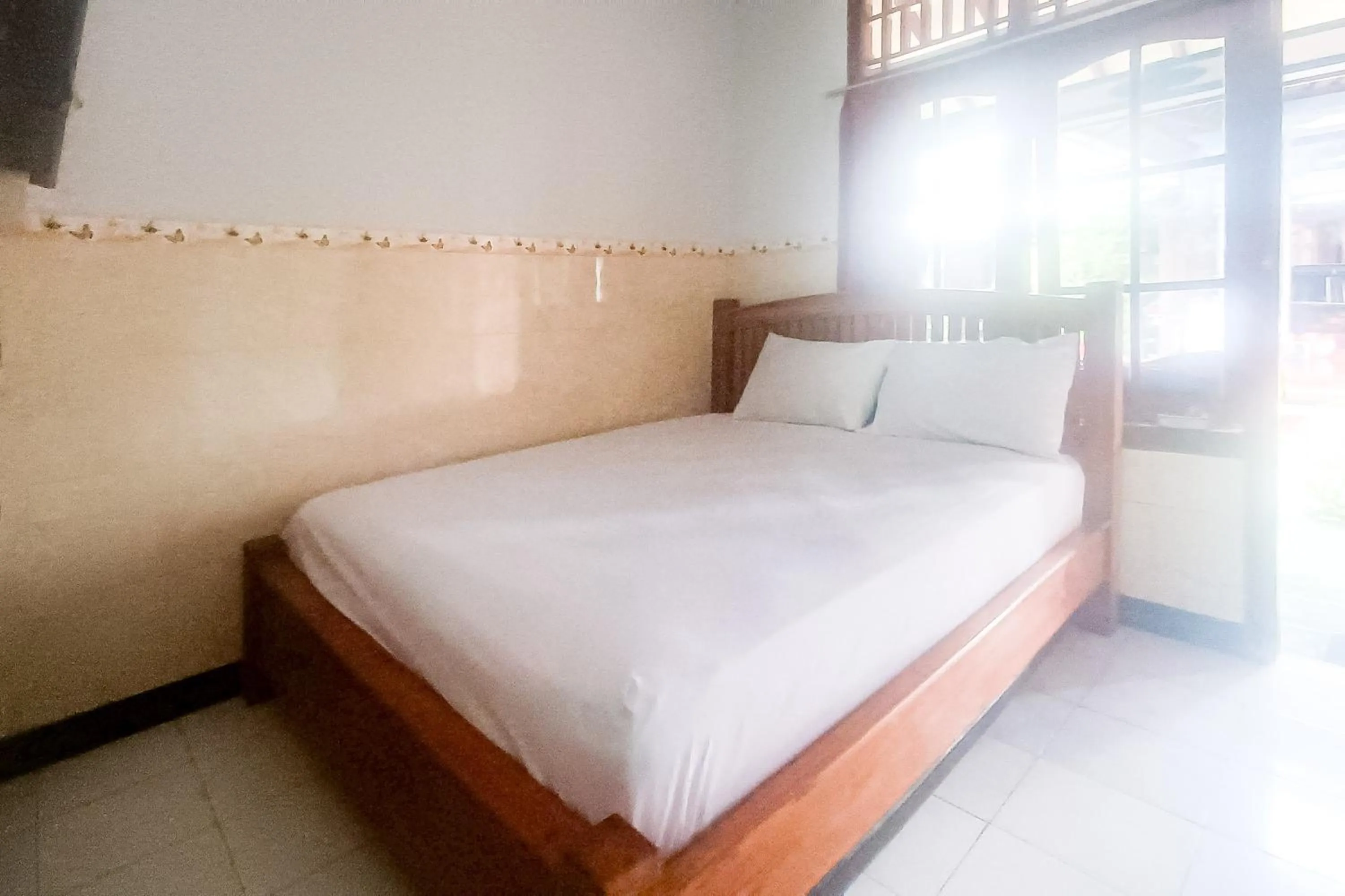 Bedroom, Bed in OYO 92560 Astri Homestay