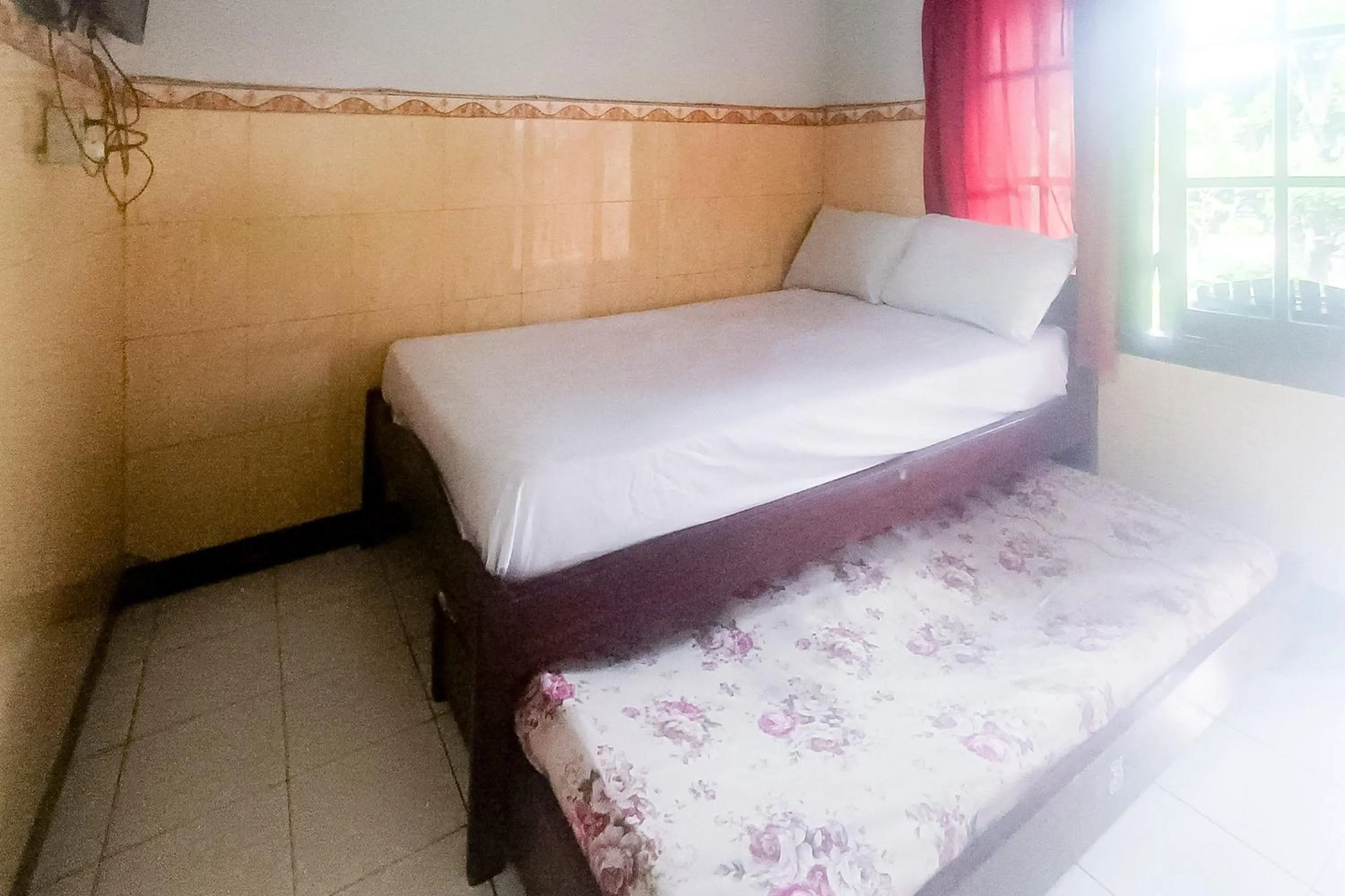 Bedroom, Bed in OYO 92560 Astri Homestay