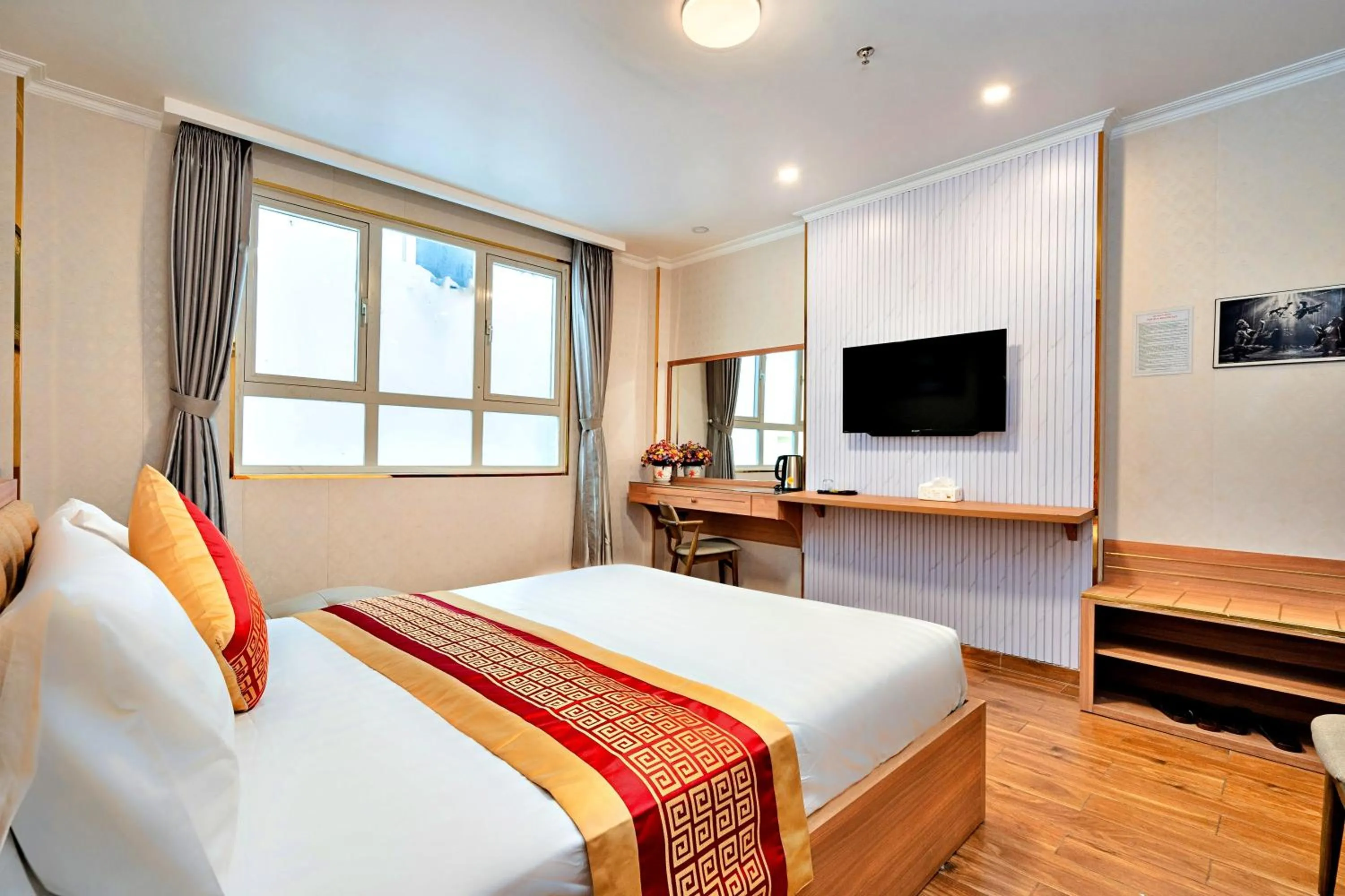 Photo of the whole room, Bed in Luna Saigon Hotel - Bui Vien Walking Street