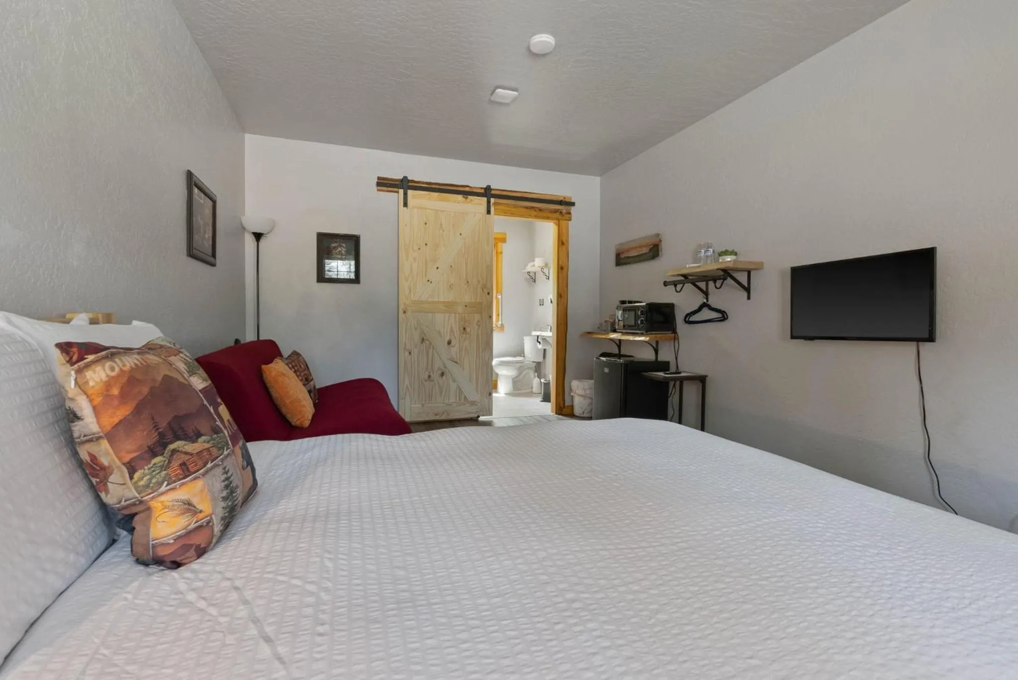 Bed in Lake Village Lodge