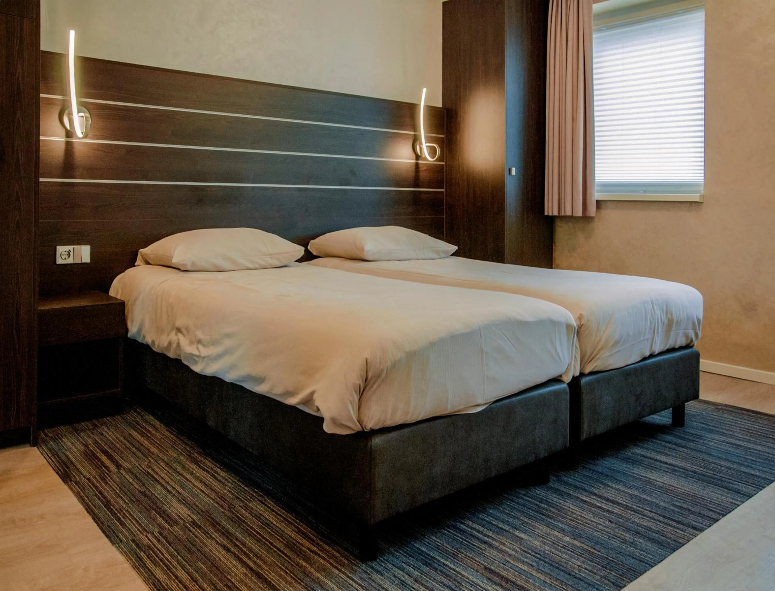 Bed in Hotel Dekkers