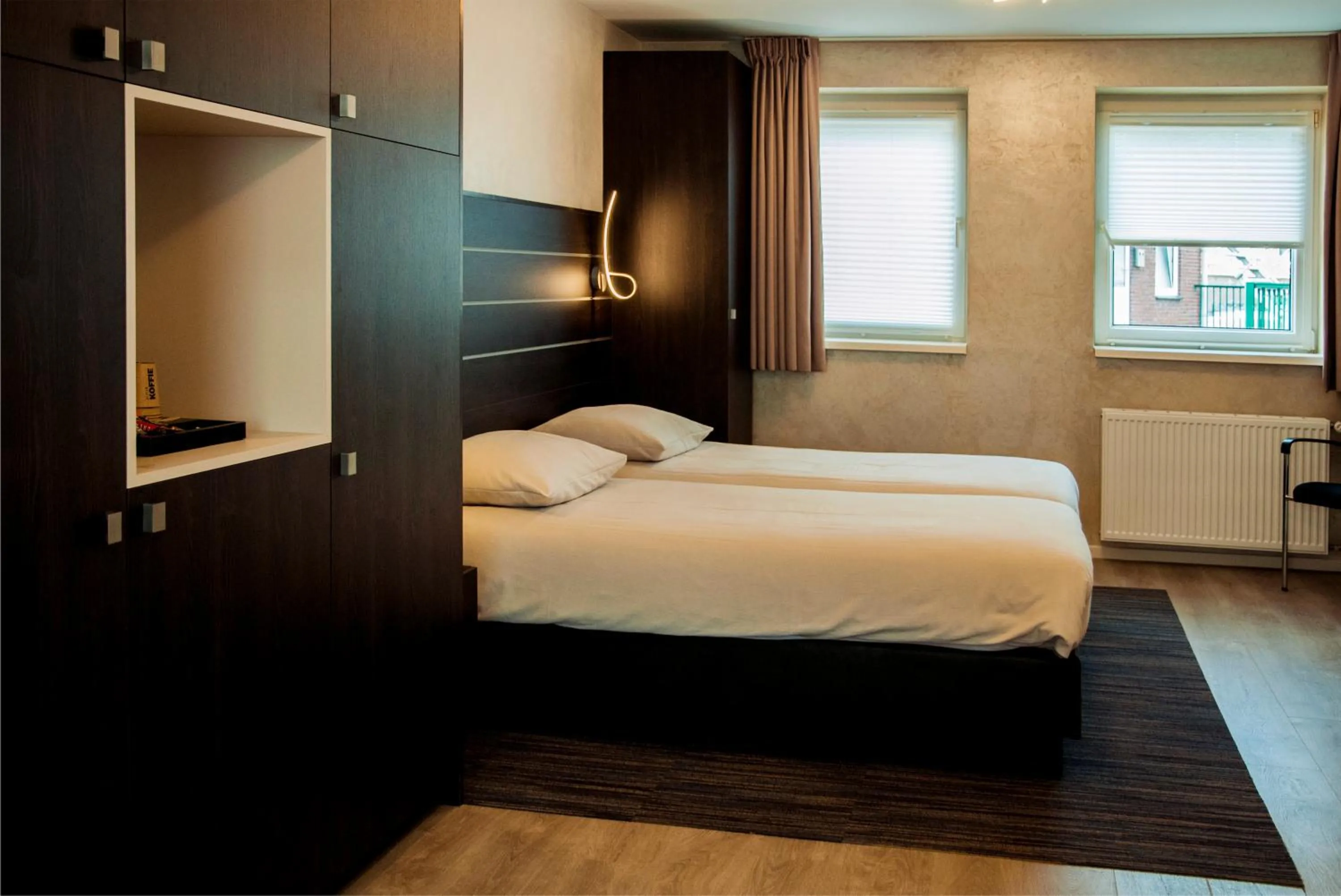 Bed in Hotel Dekkers