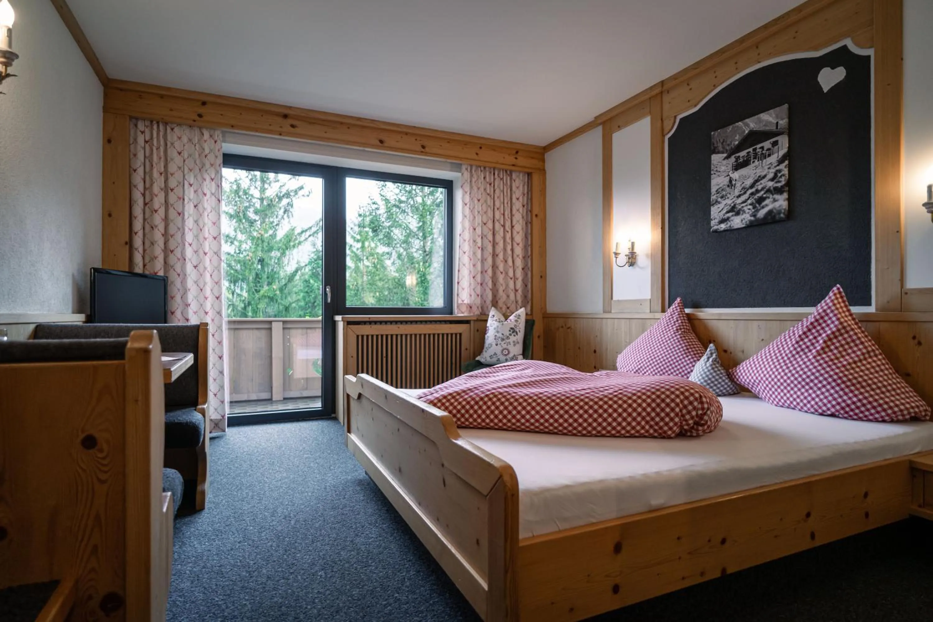 Bed in Hotel Landhaus Tirolerherz
