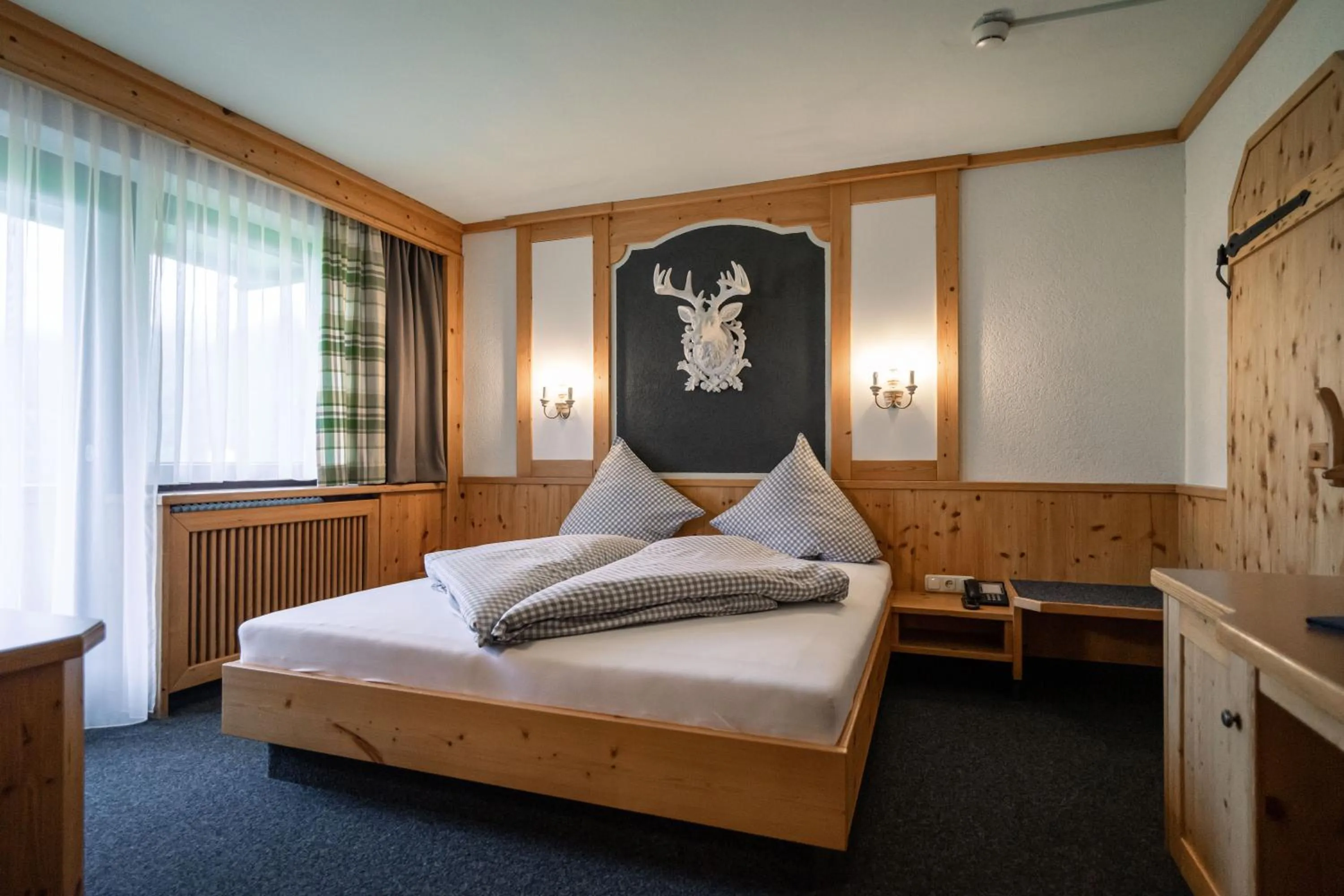 Bed in Hotel Landhaus Tirolerherz