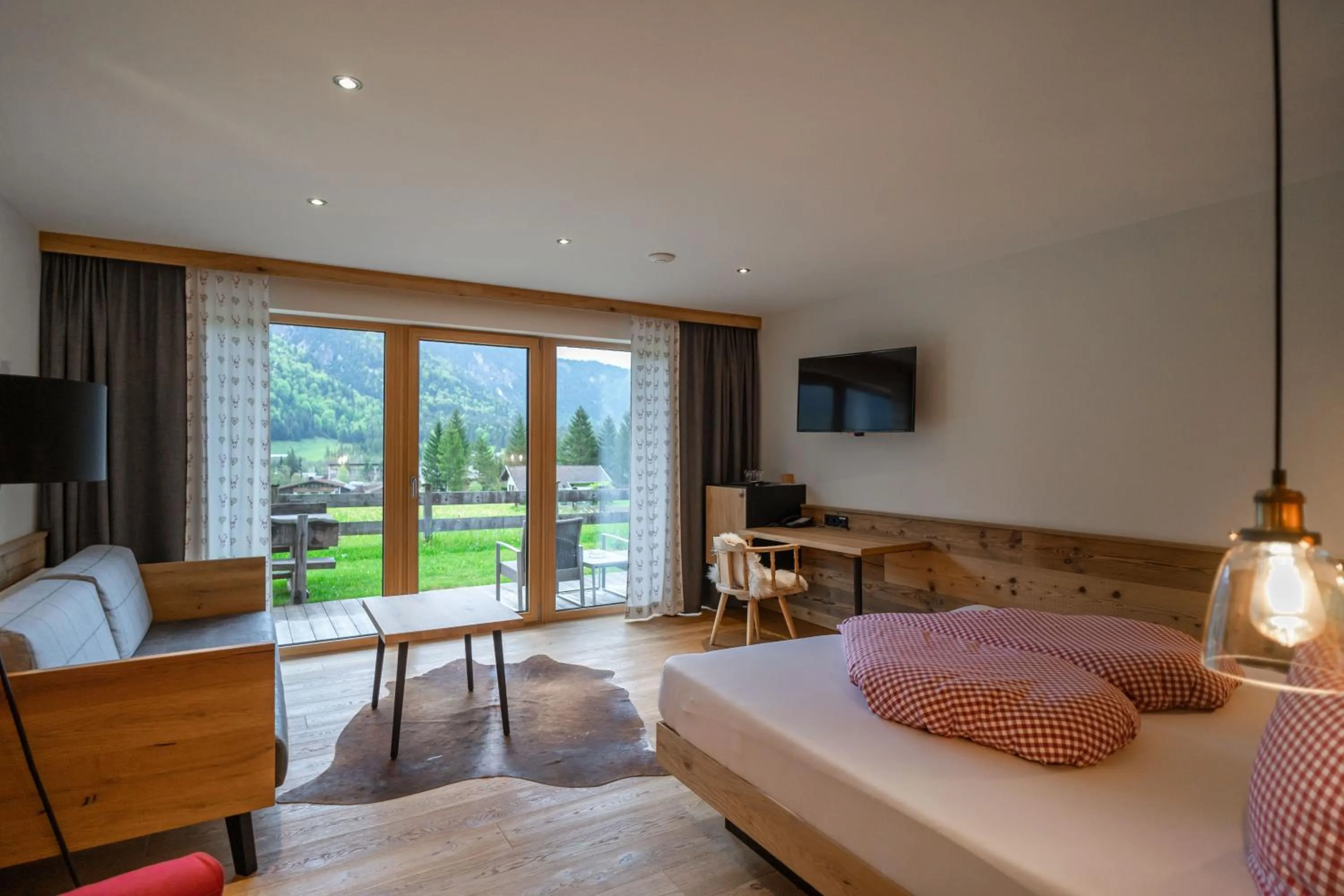 Bed in Hotel Landhaus Tirolerherz