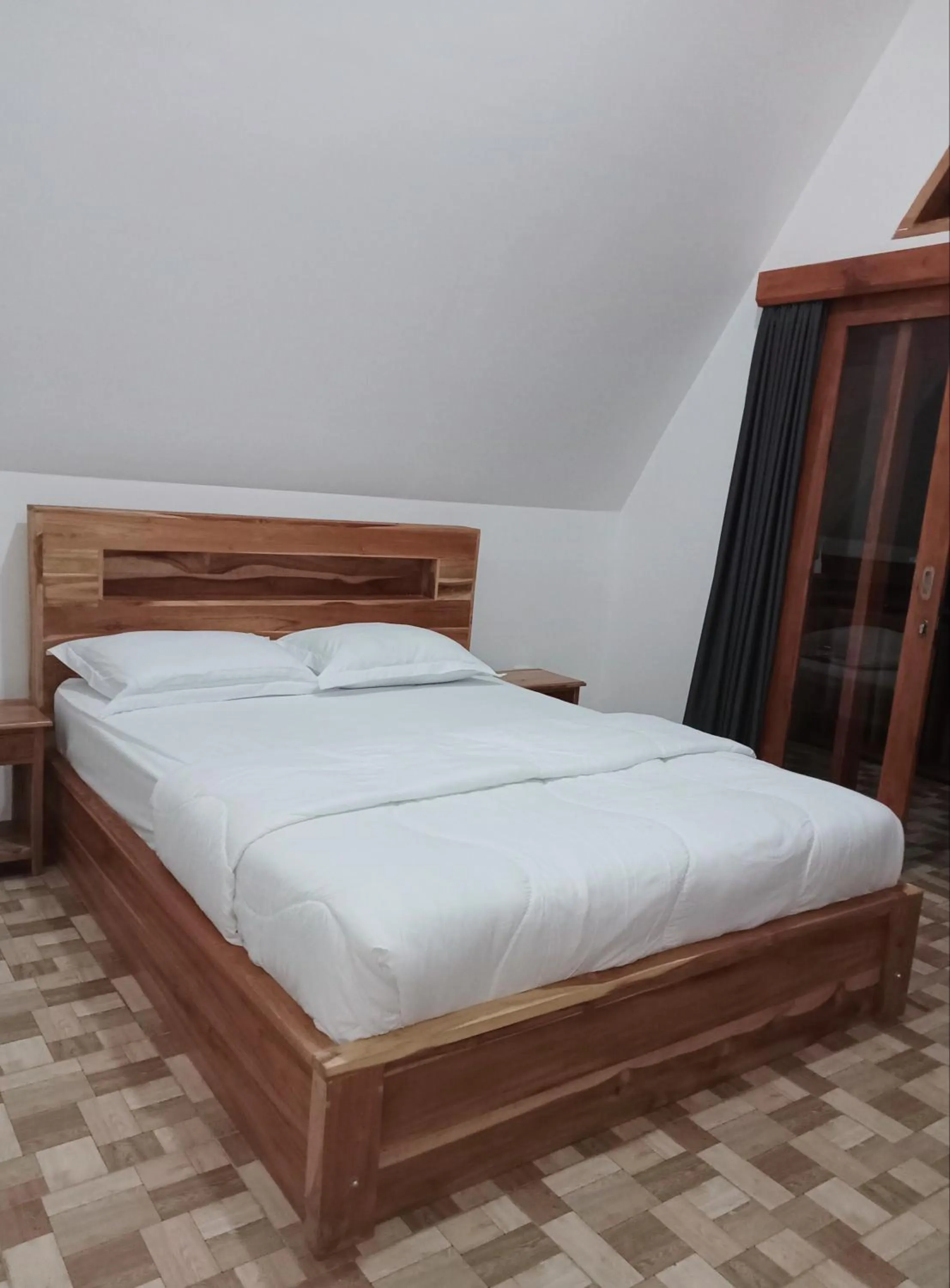 Bed in Popitan Garden Campground & Glamping Bedugul