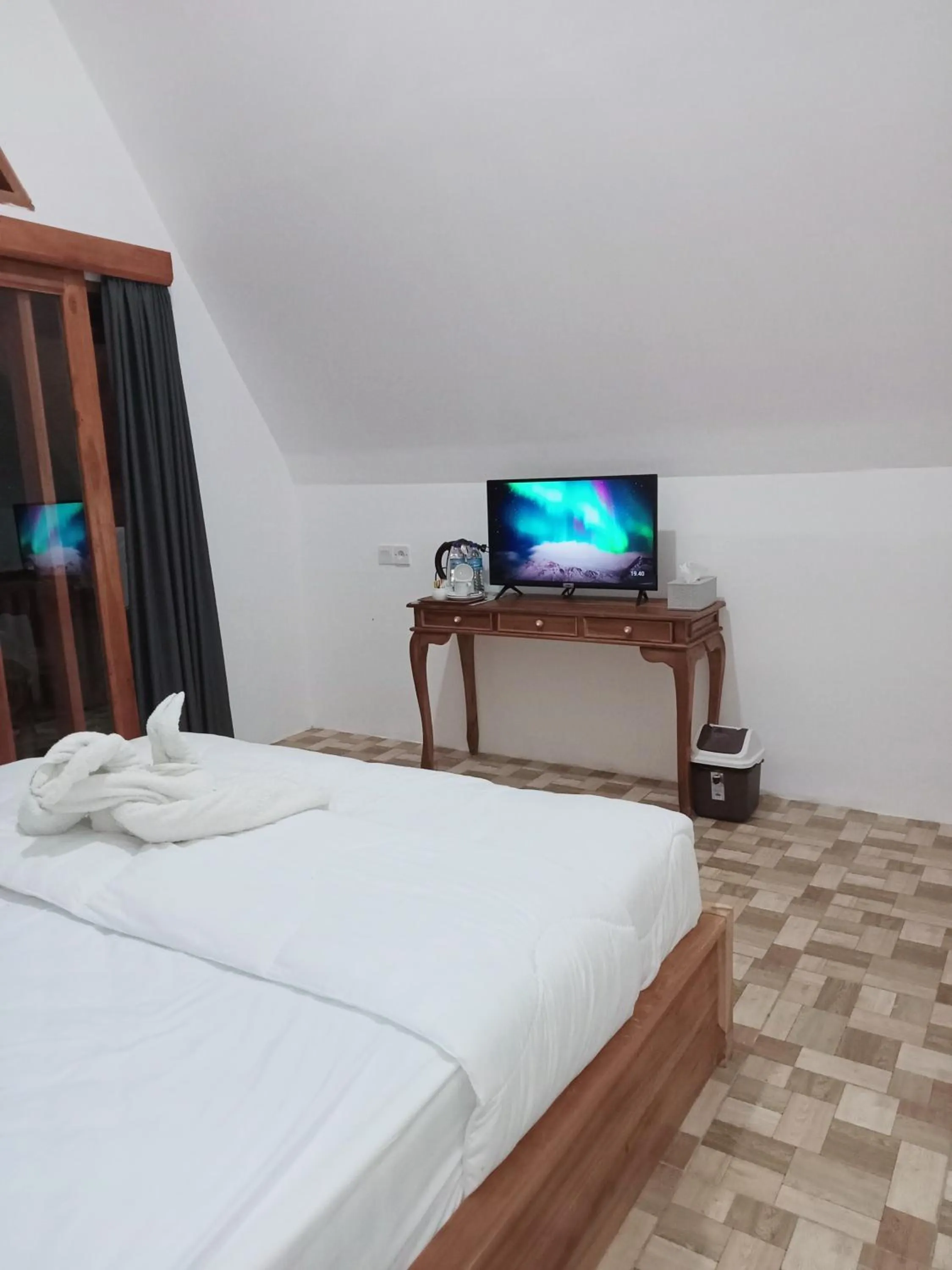 Bed in Popitan Garden Campground & Glamping Bedugul