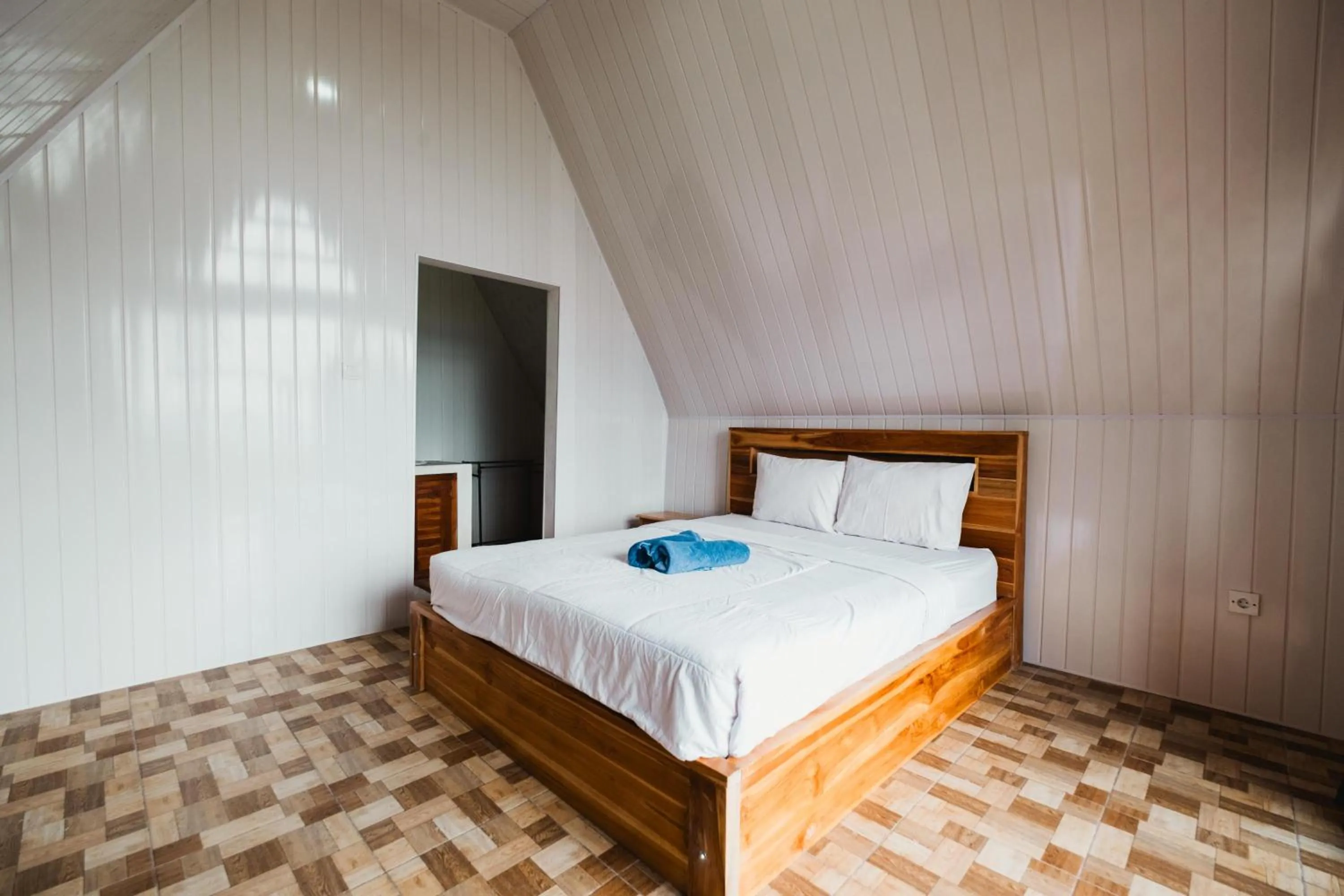 Bed in Popitan Garden Campground & Glamping Bedugul