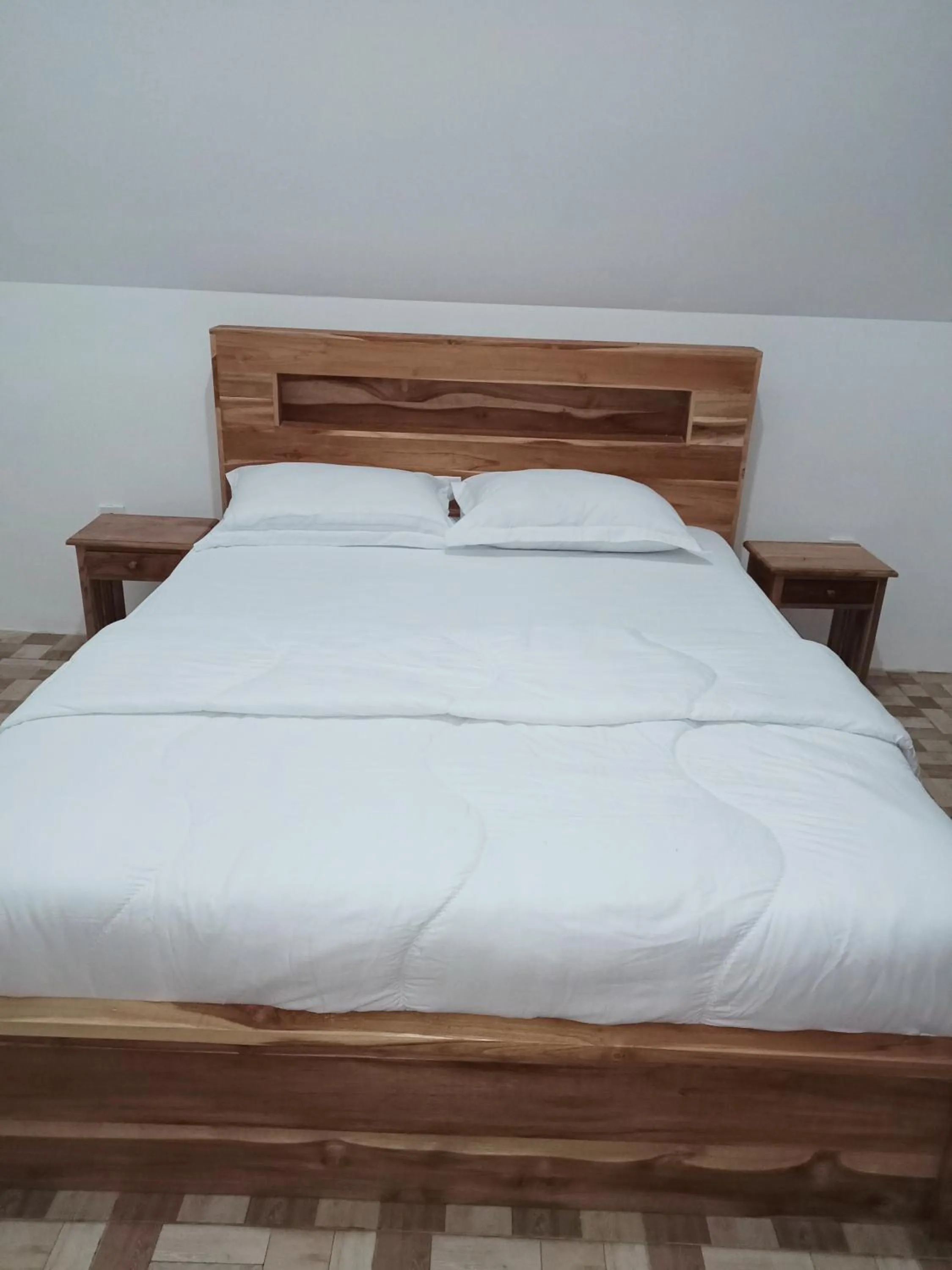 Bed in Popitan Garden Campground & Glamping Bedugul