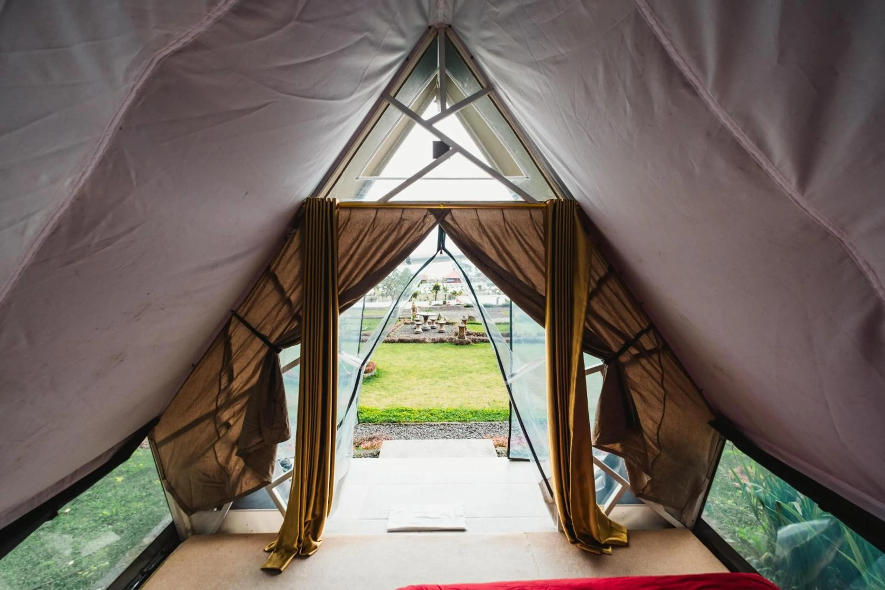 Bed in Popitan Garden Campground & Glamping Bedugul