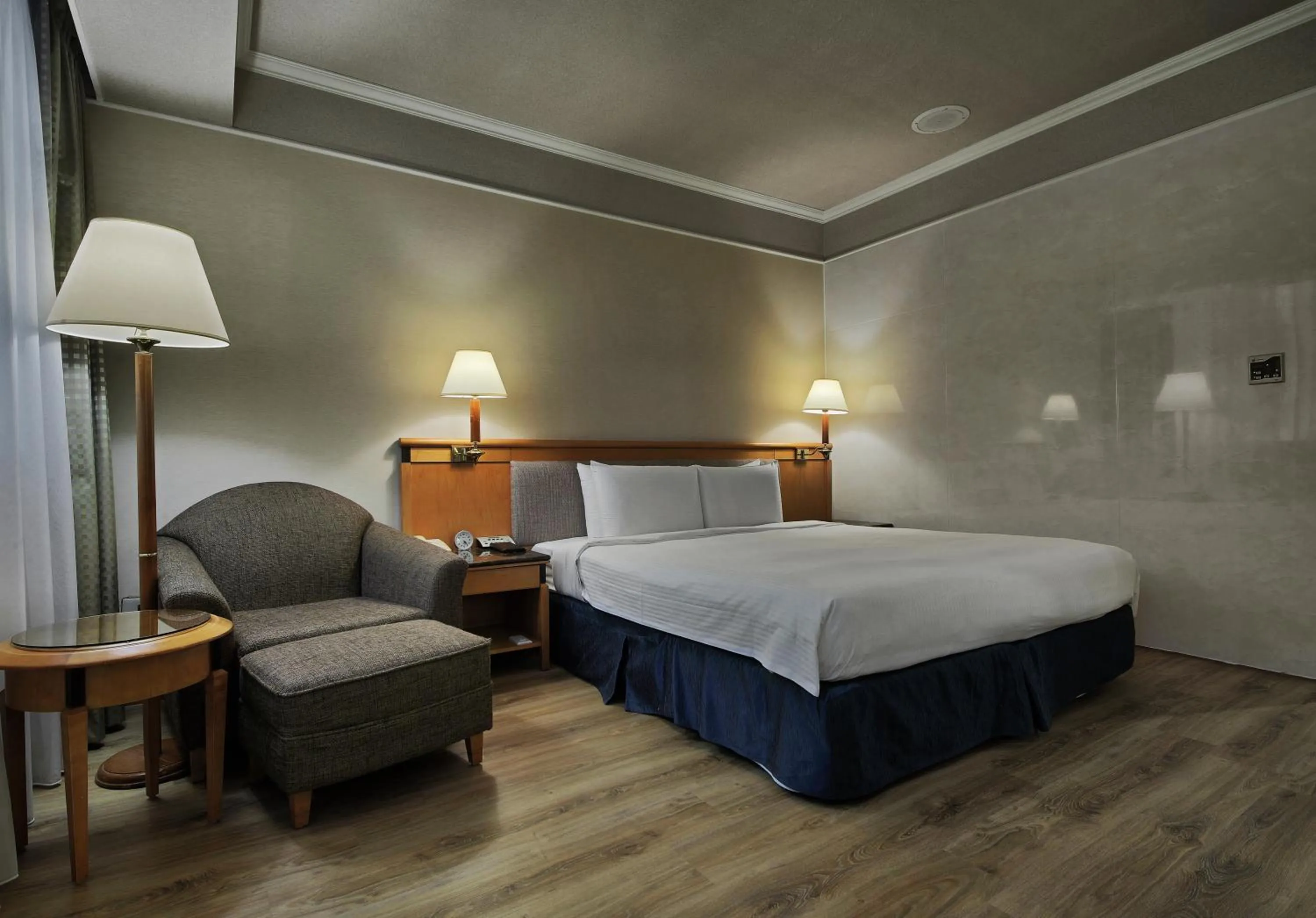 Photo of the whole room, Bed in The Carlton Hotel Hsinchu