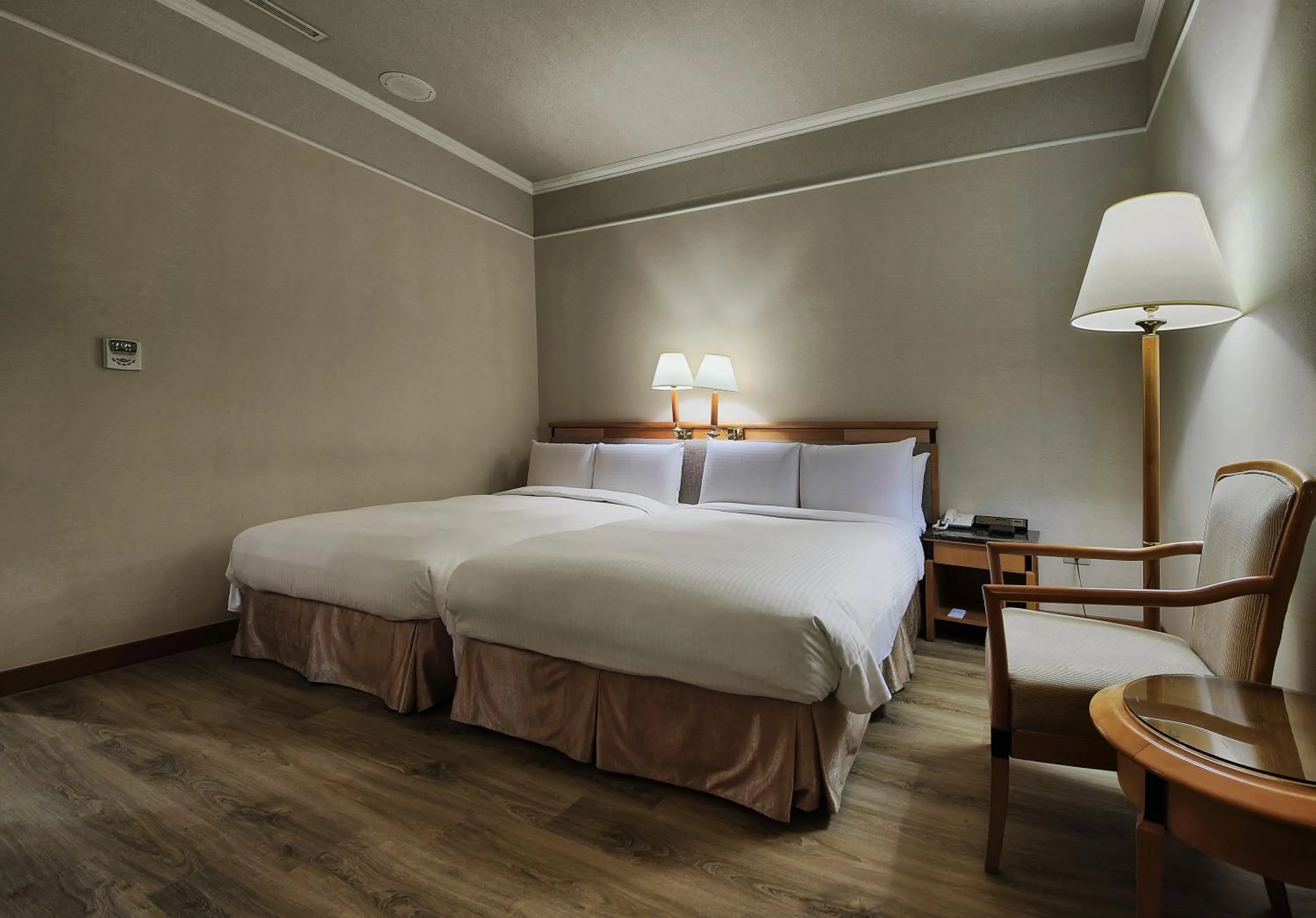 Photo of the whole room, Bed in The Carlton Hotel Hsinchu