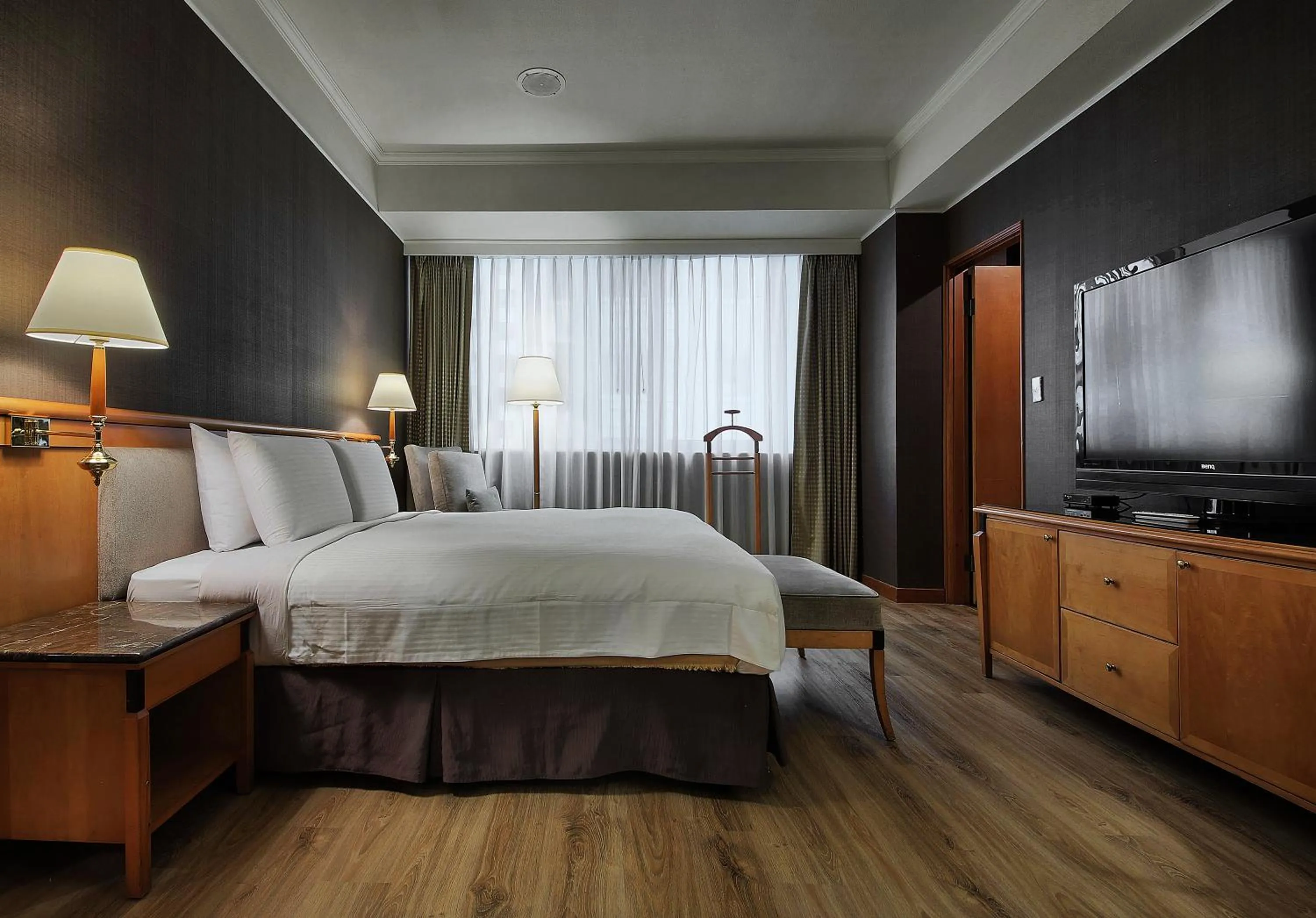 Photo of the whole room, Bed in The Carlton Hotel Hsinchu