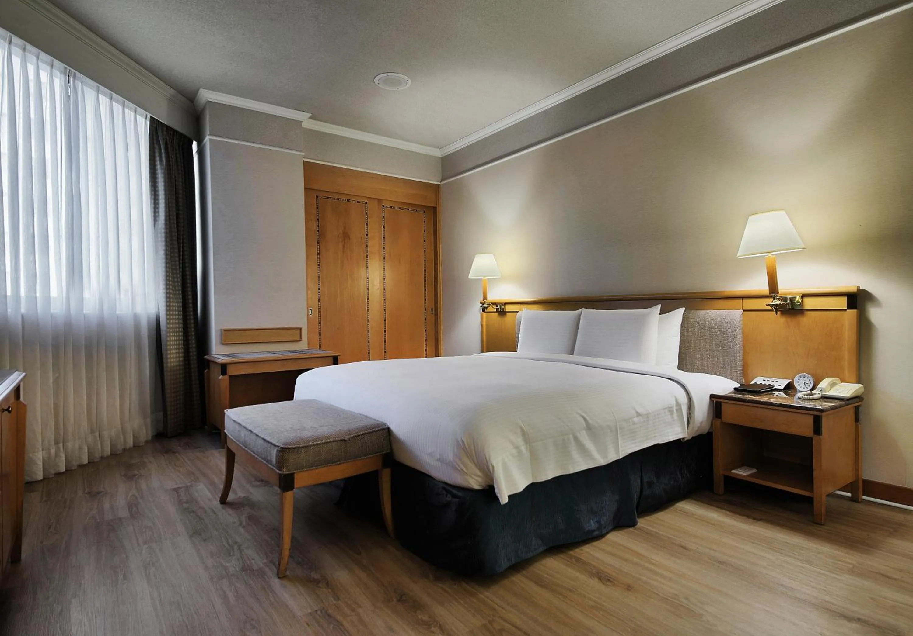 Photo of the whole room, Bed in The Carlton Hotel Hsinchu