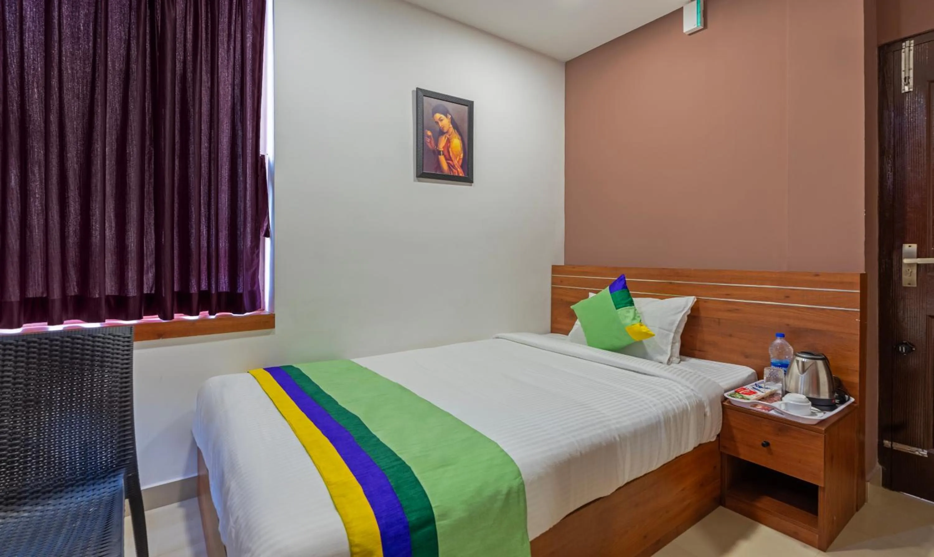 Bed in Treebo JP Residency