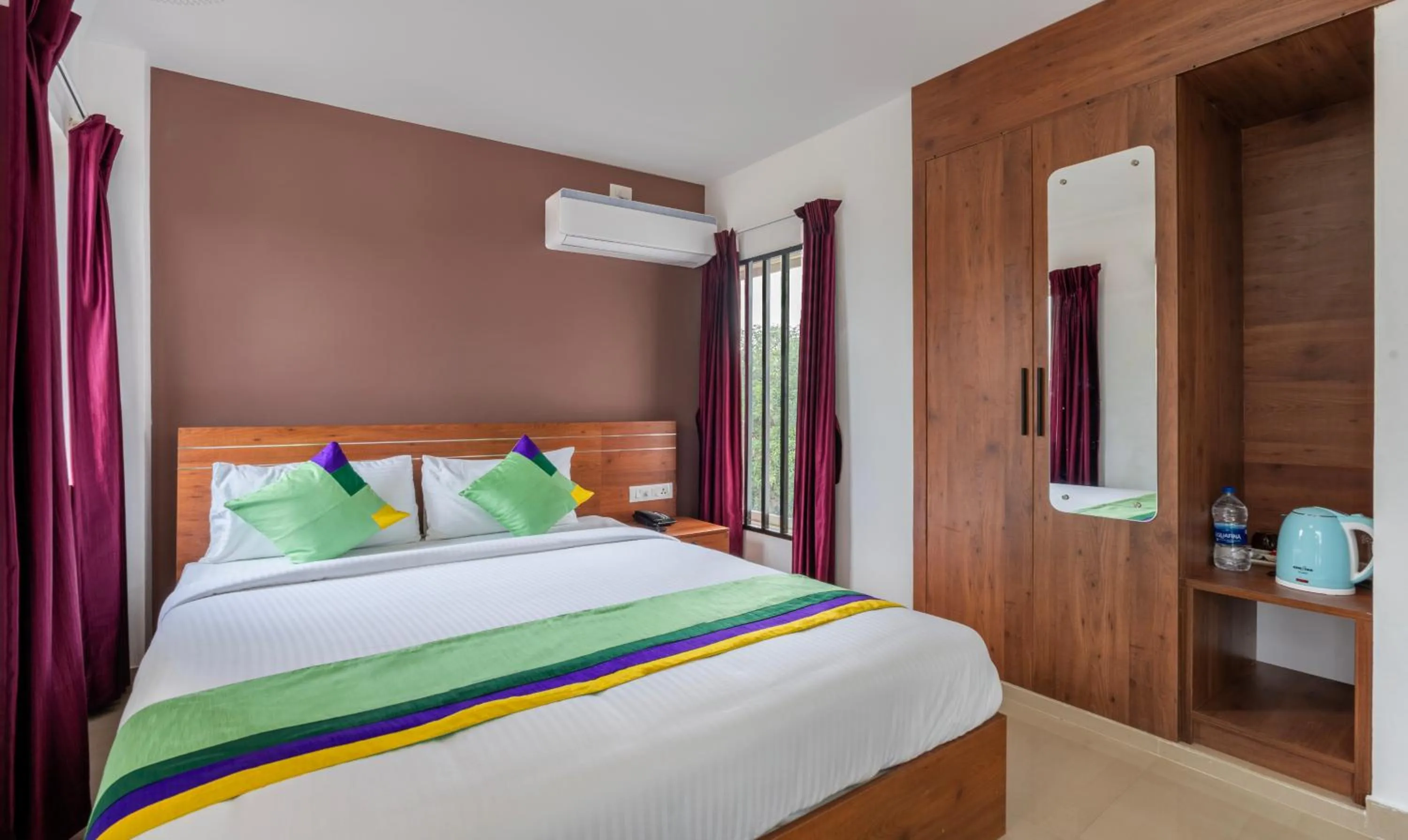 Bed in Treebo JP Residency