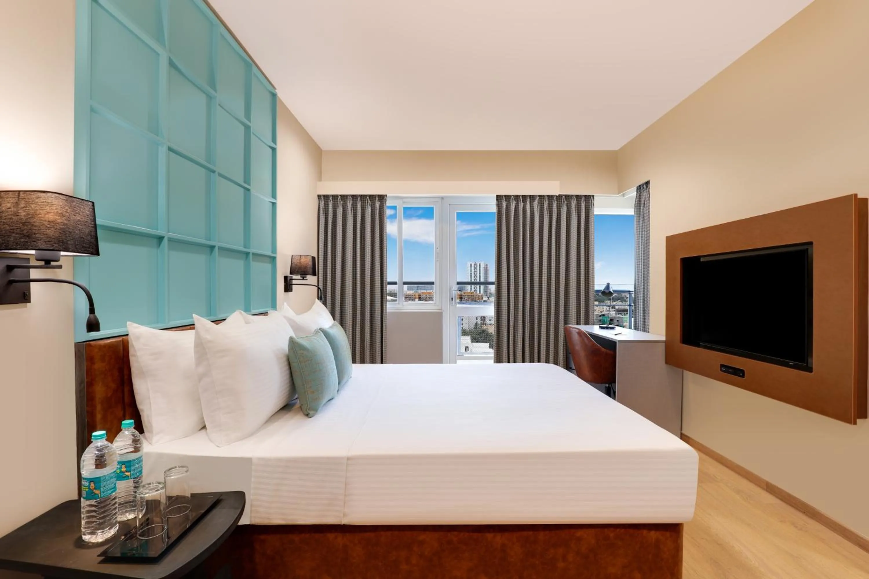 Photo of the whole room, Bed in Lemon Tree Suites, Whitefield, Bengaluru