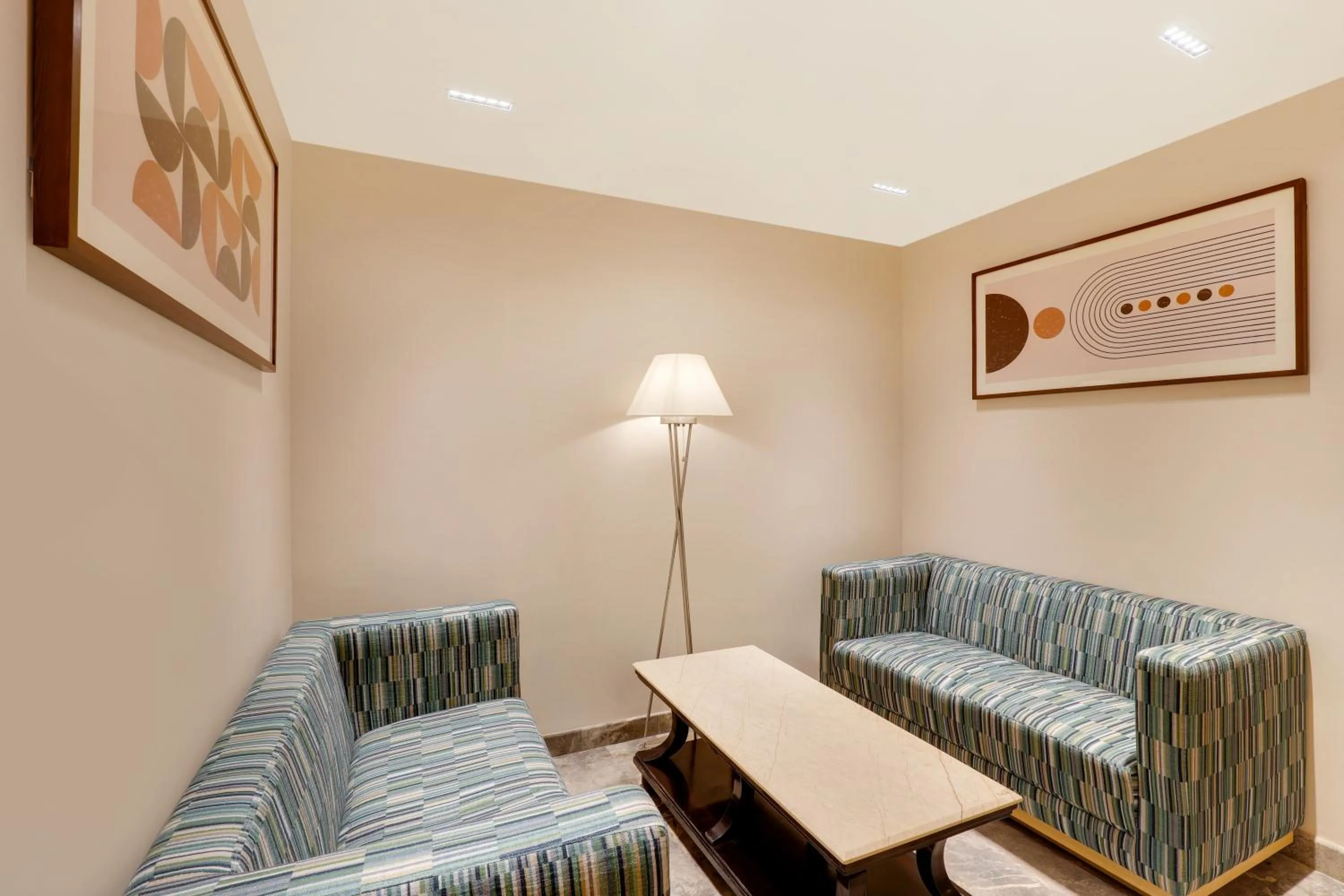 Seating area in Lemon Tree Suites, Whitefield, Bengaluru