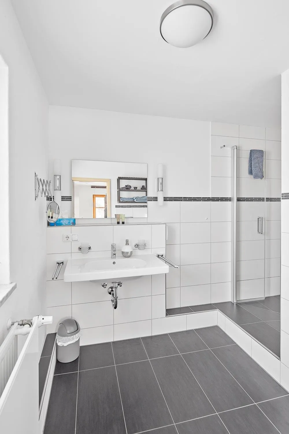 Shower in Hotel Garni Alte Säge Ruhpolding inkl Chiemgaukarte