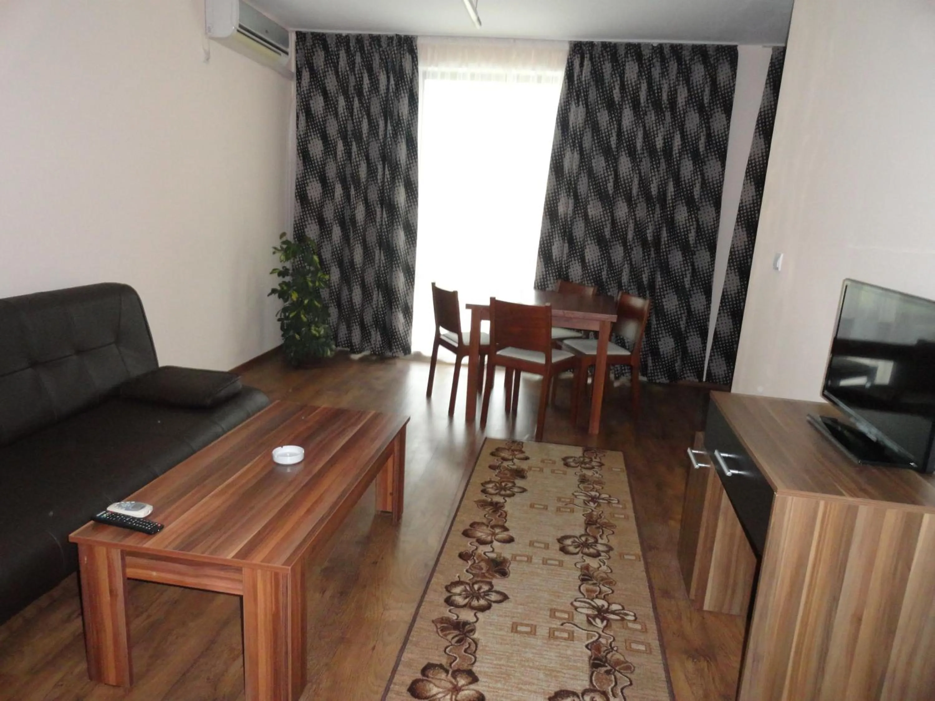 Living room in Cantilena Complex